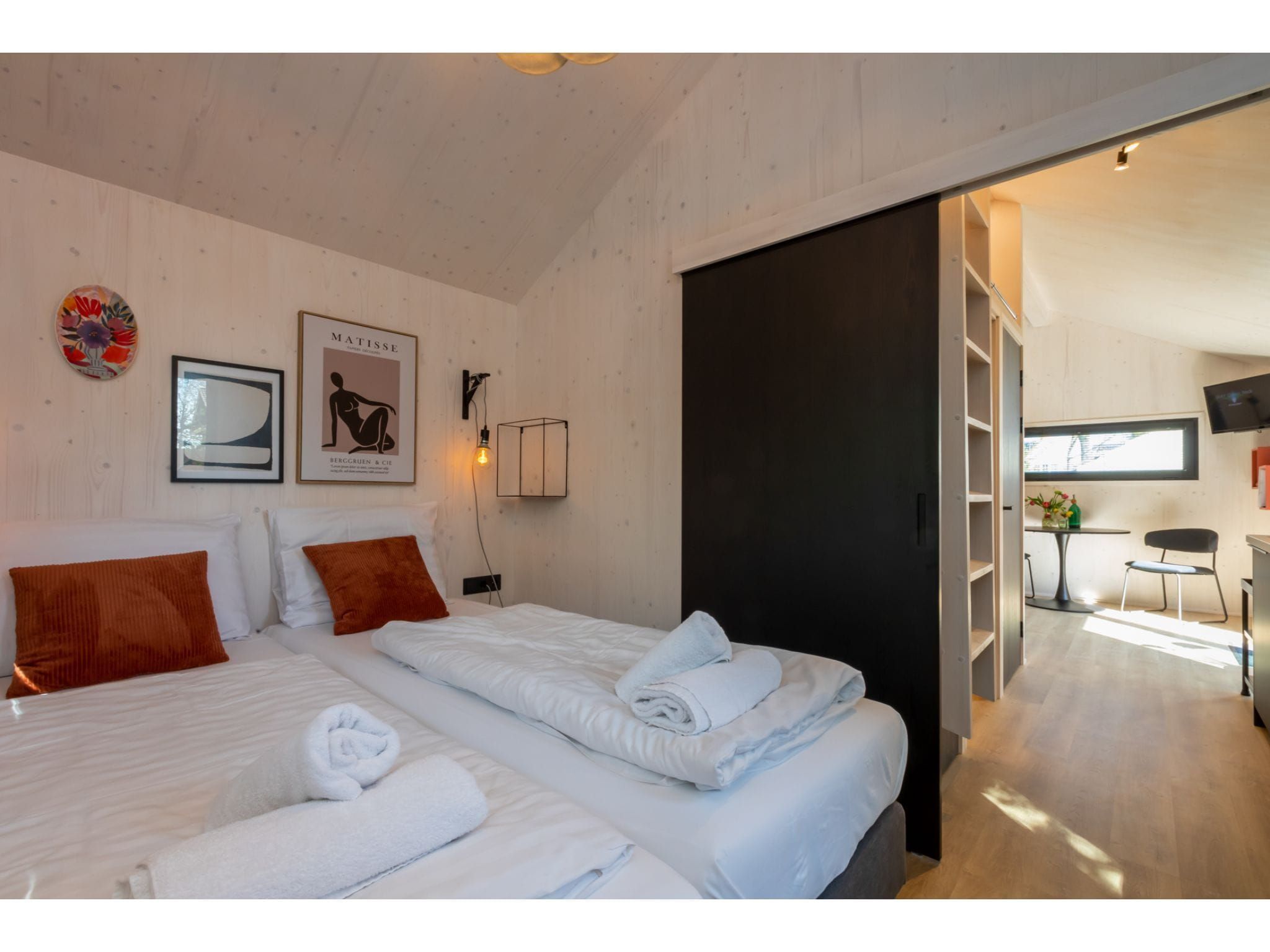 Een slaapkamer van Tinyhouse La Mouette in Zoutelande