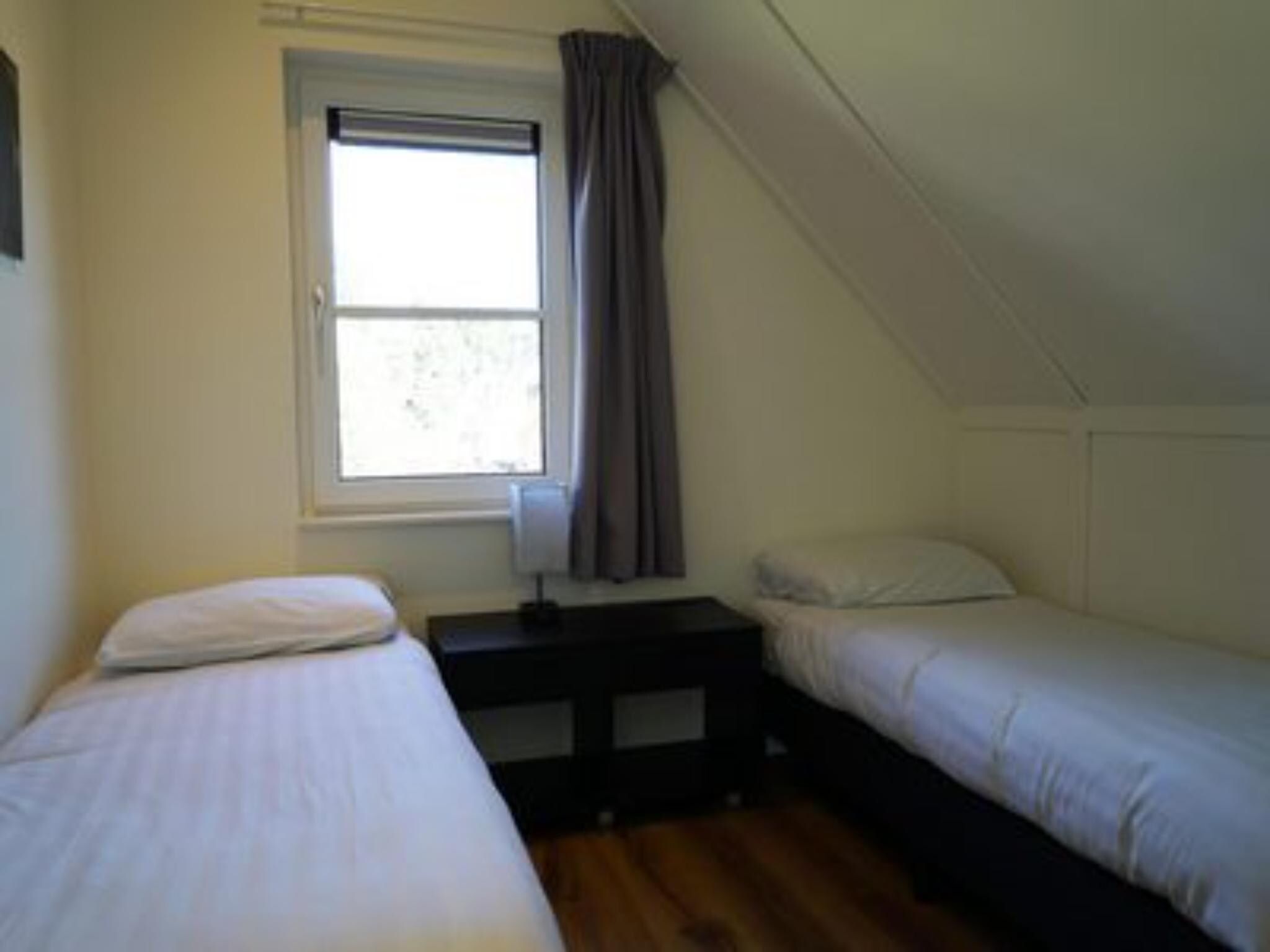 Een slaapkamer van De&nbsp;Wiersse&nbsp;8 in Lochem