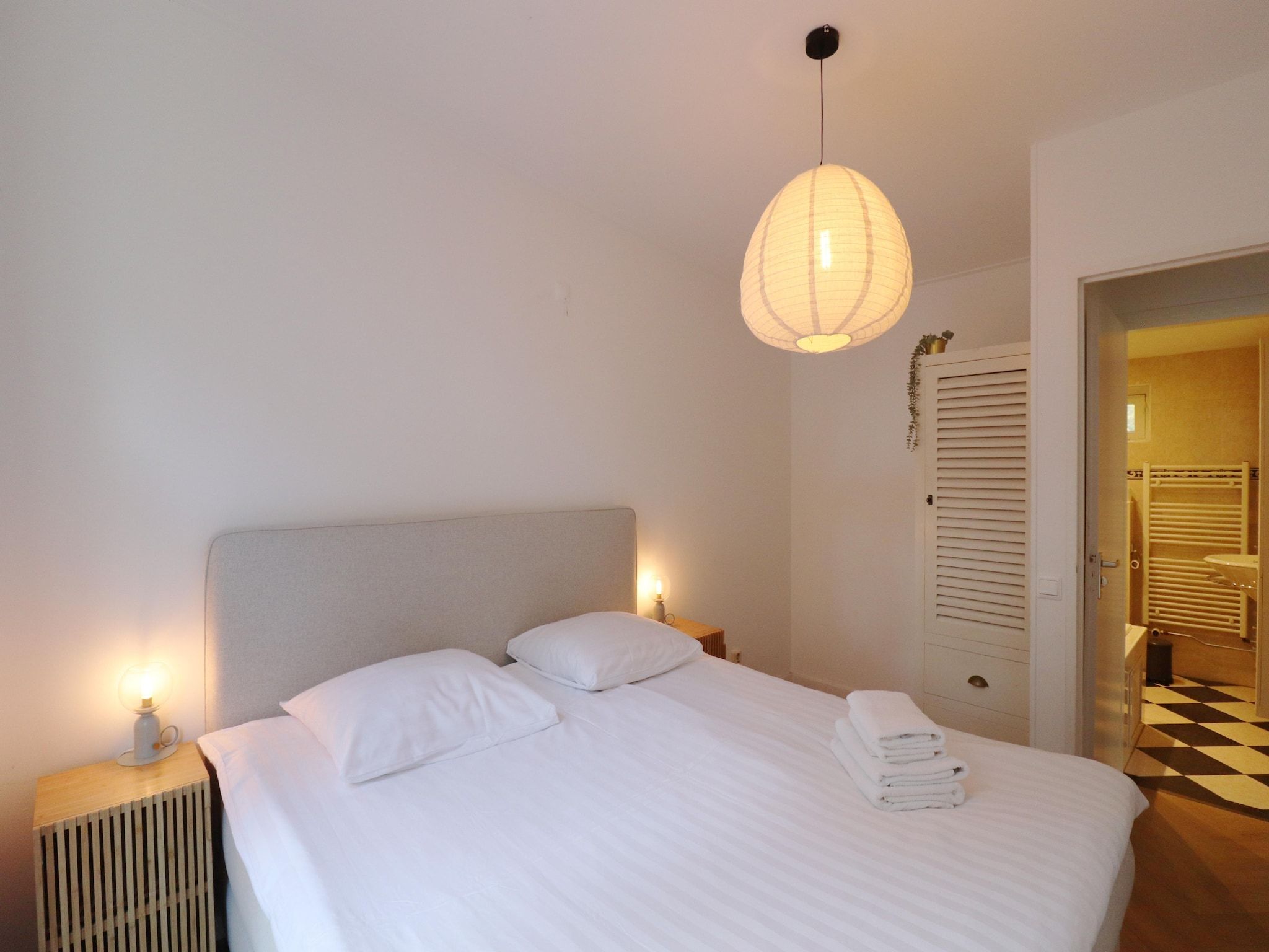 Een slaapkamer van Wellnes suite in Zelhem