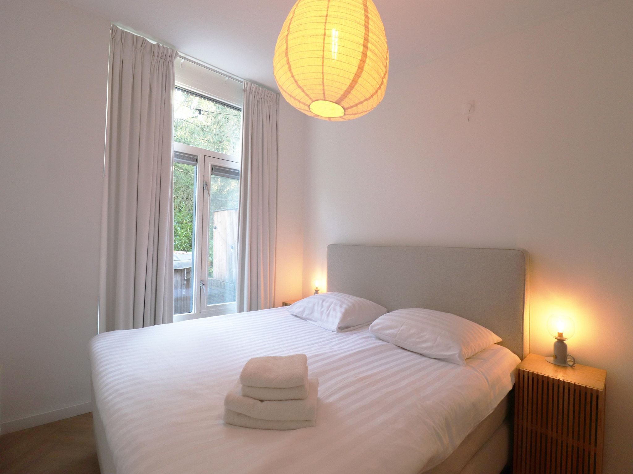 Een slaapkamer van Wellnes suite in Zelhem