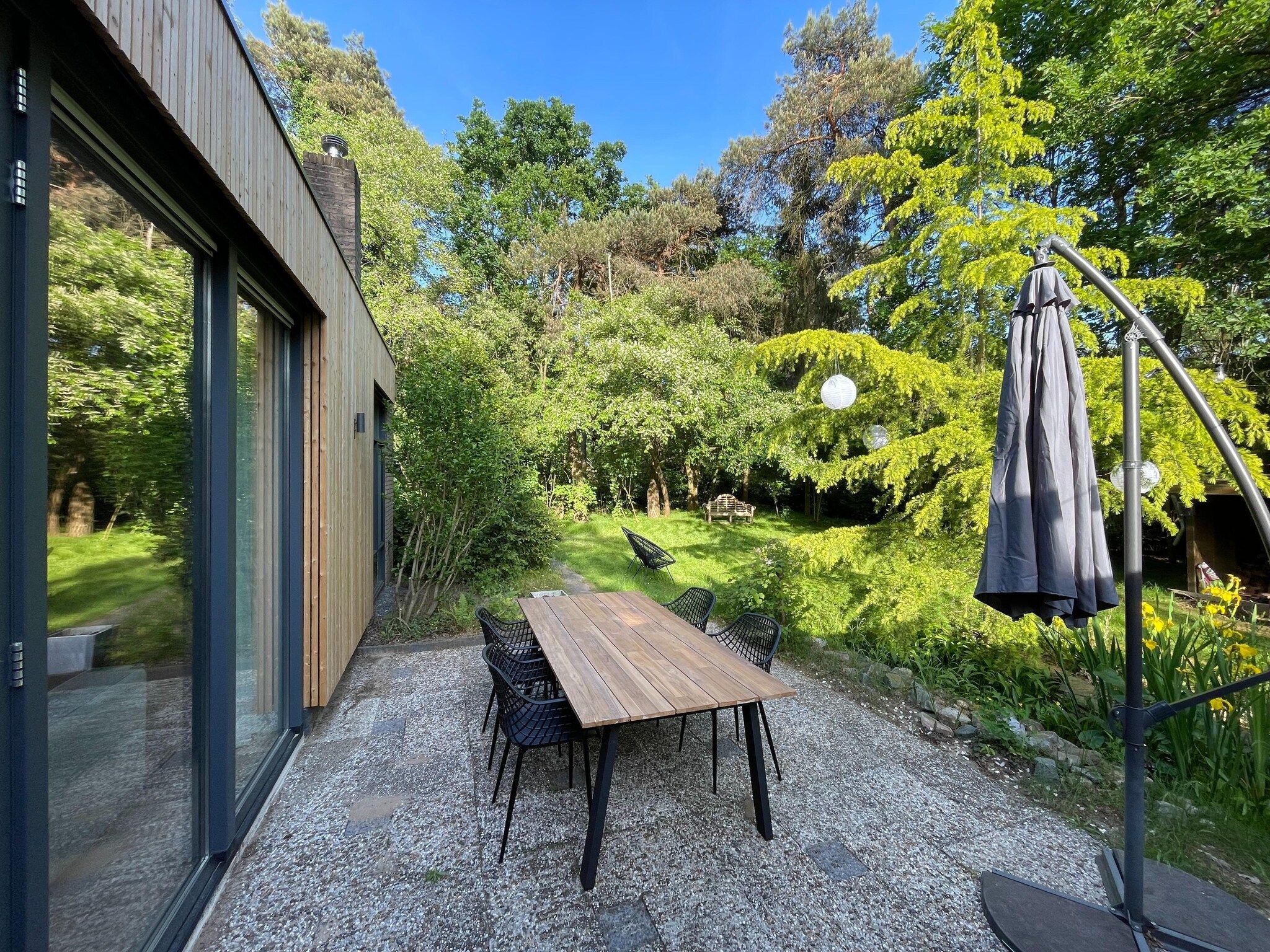 De tuin van Bos suite in Zelhem