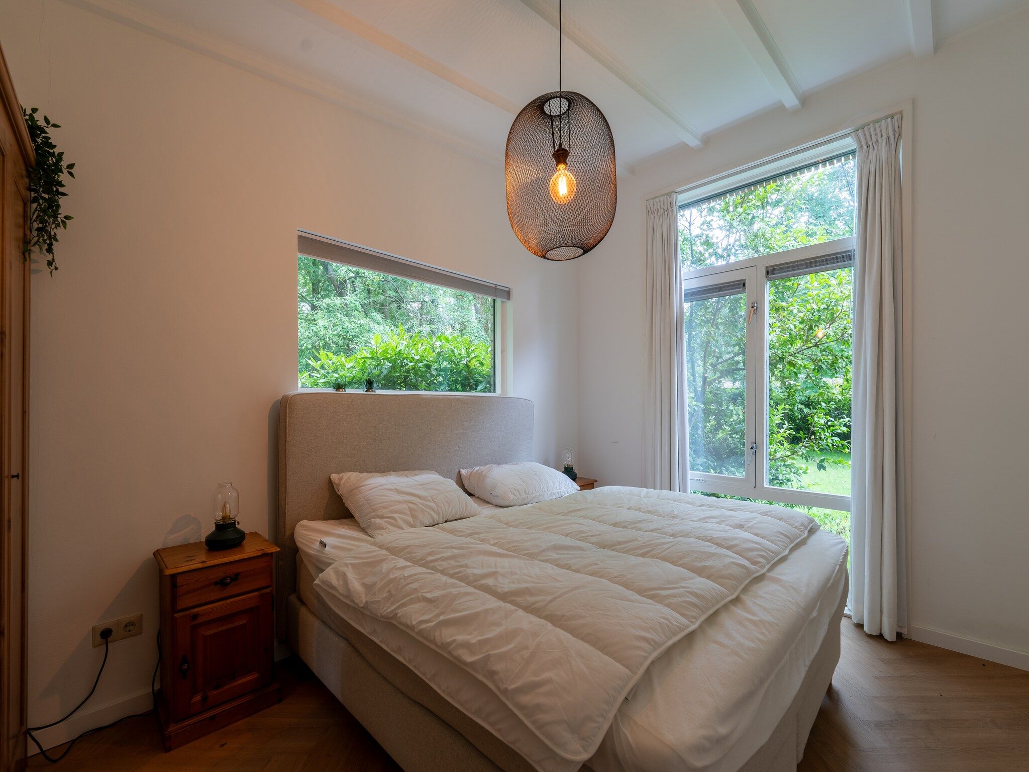 Een slaapkamer van Bos suite in Zelhem