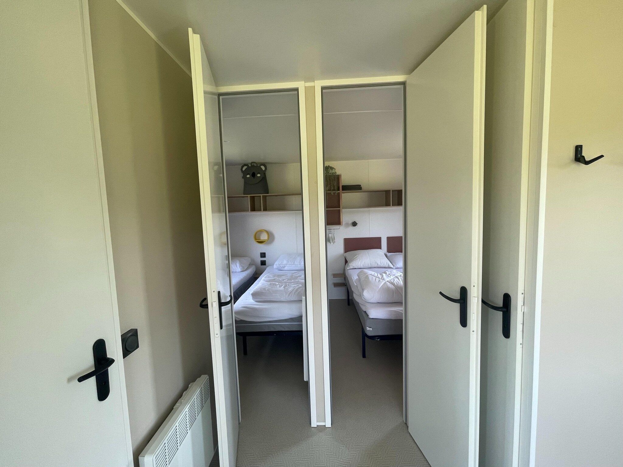 Een slaapkamer van Elperhof Leberenlodge in Schoonloo