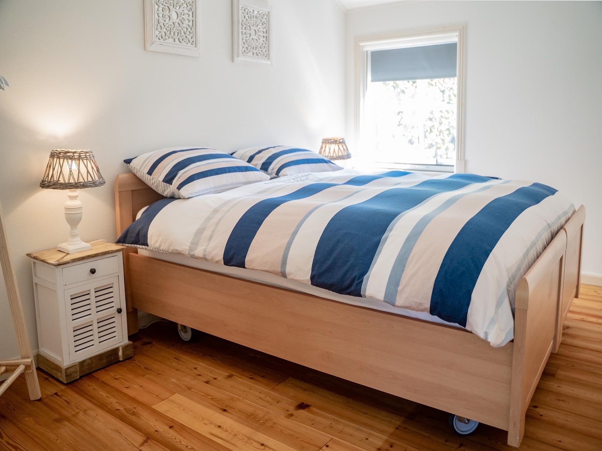 Een slaapkamer van Wad'n Leven en Geluk in Paesens