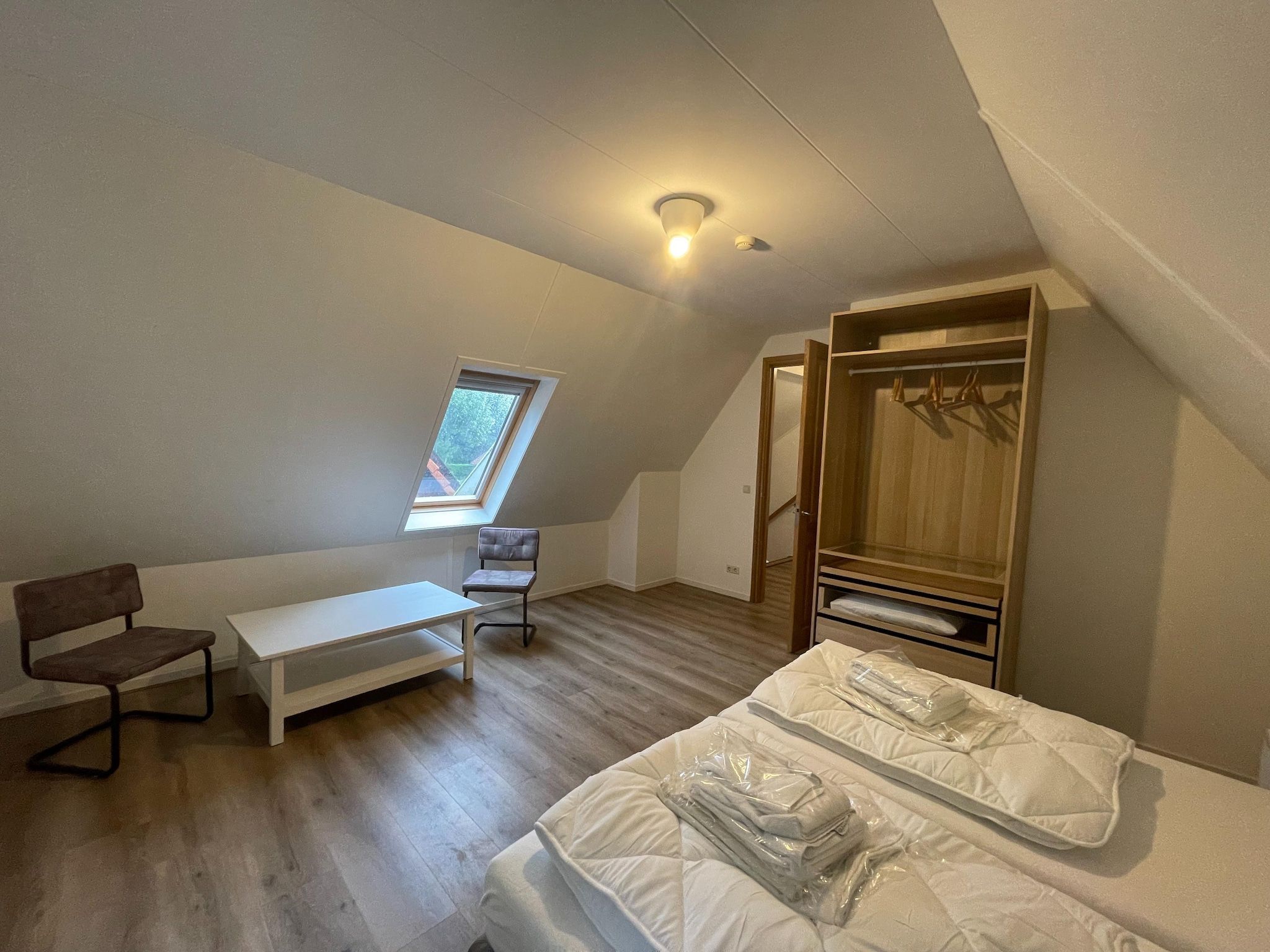 Een slaapkamer van Aldubo in Den Burg