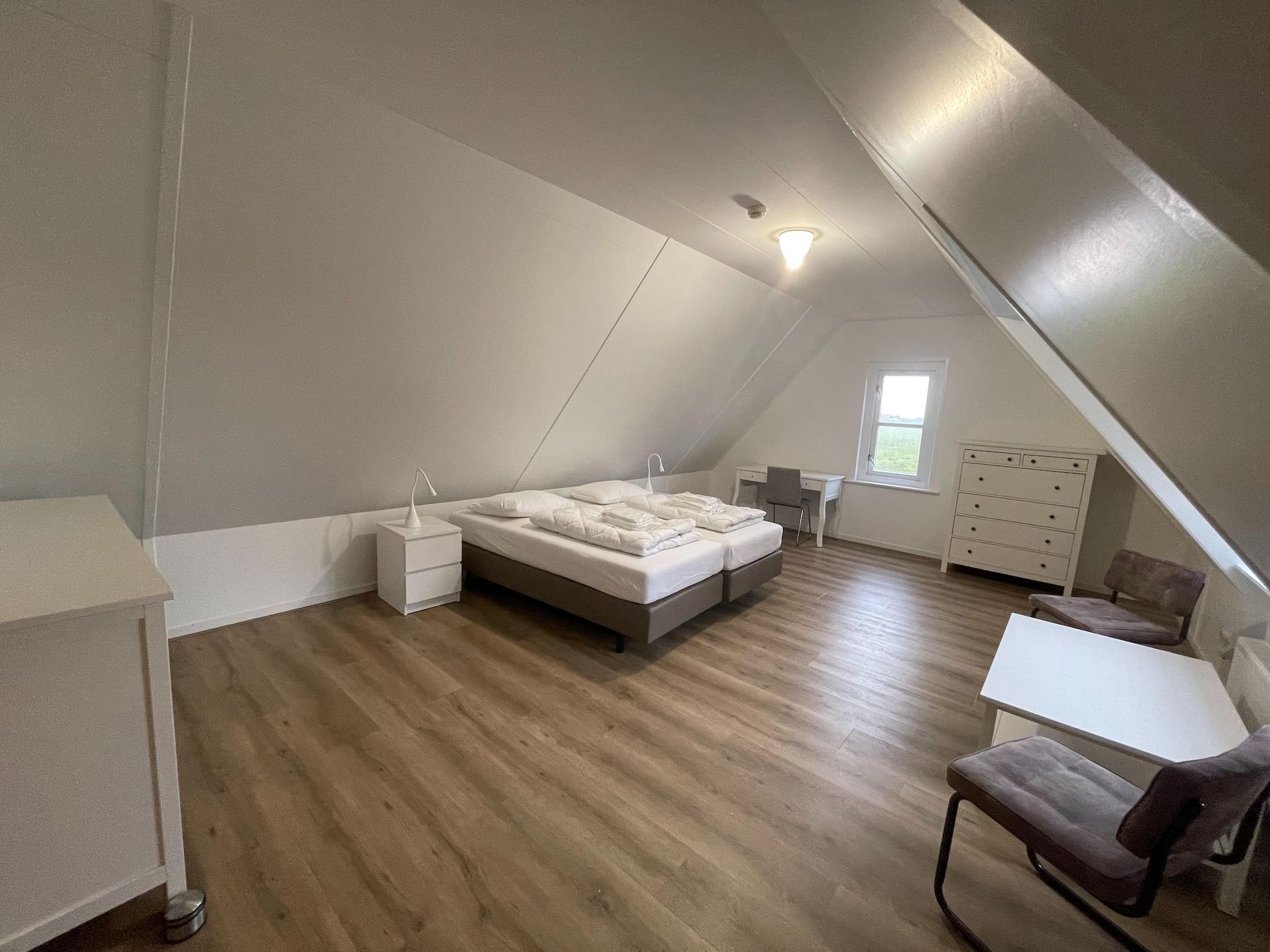 Een slaapkamer van Aldubo in Den Burg