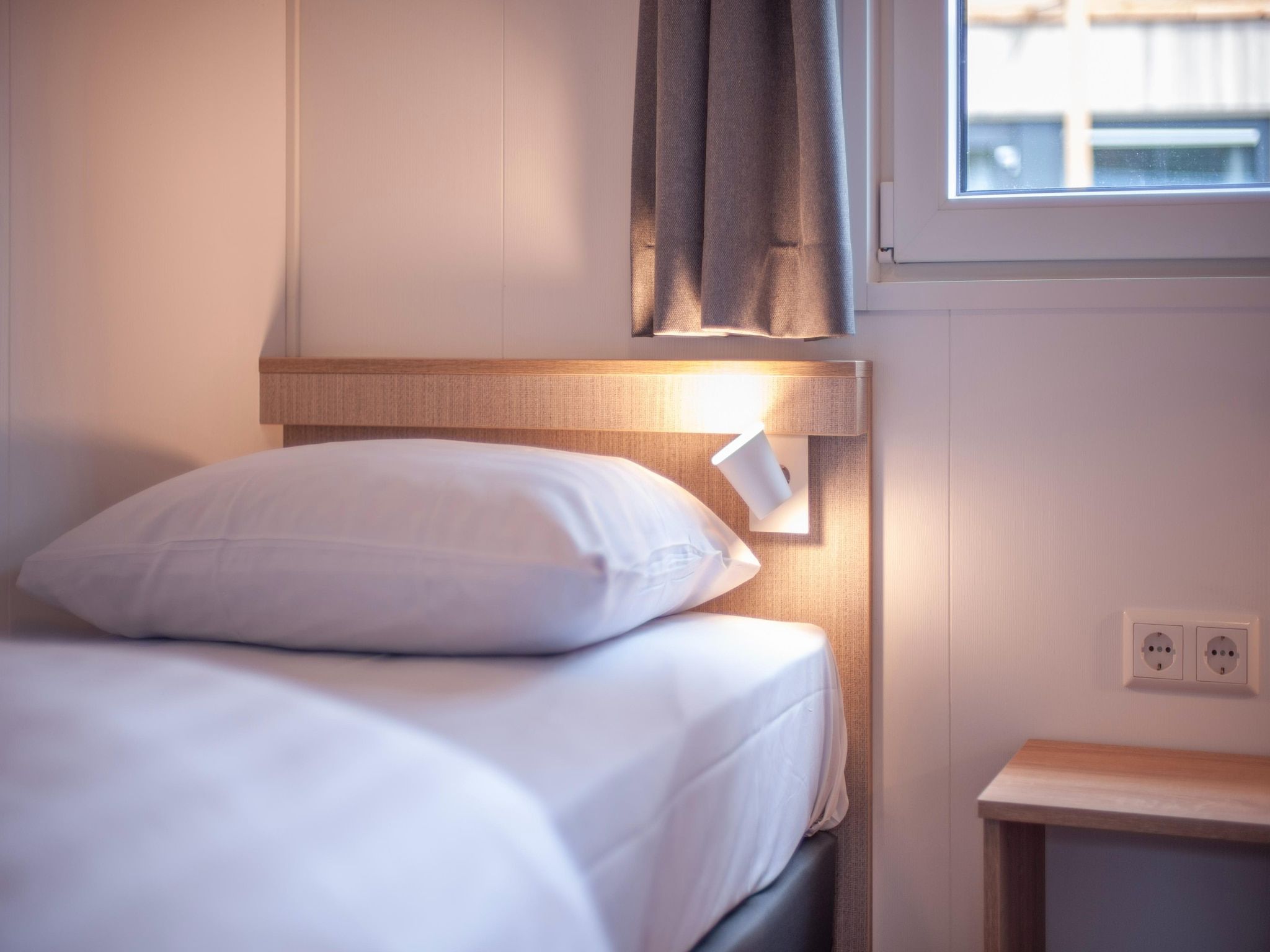 Een slaapkamer van Bospark 't Wolfsven 19 in Mierlo