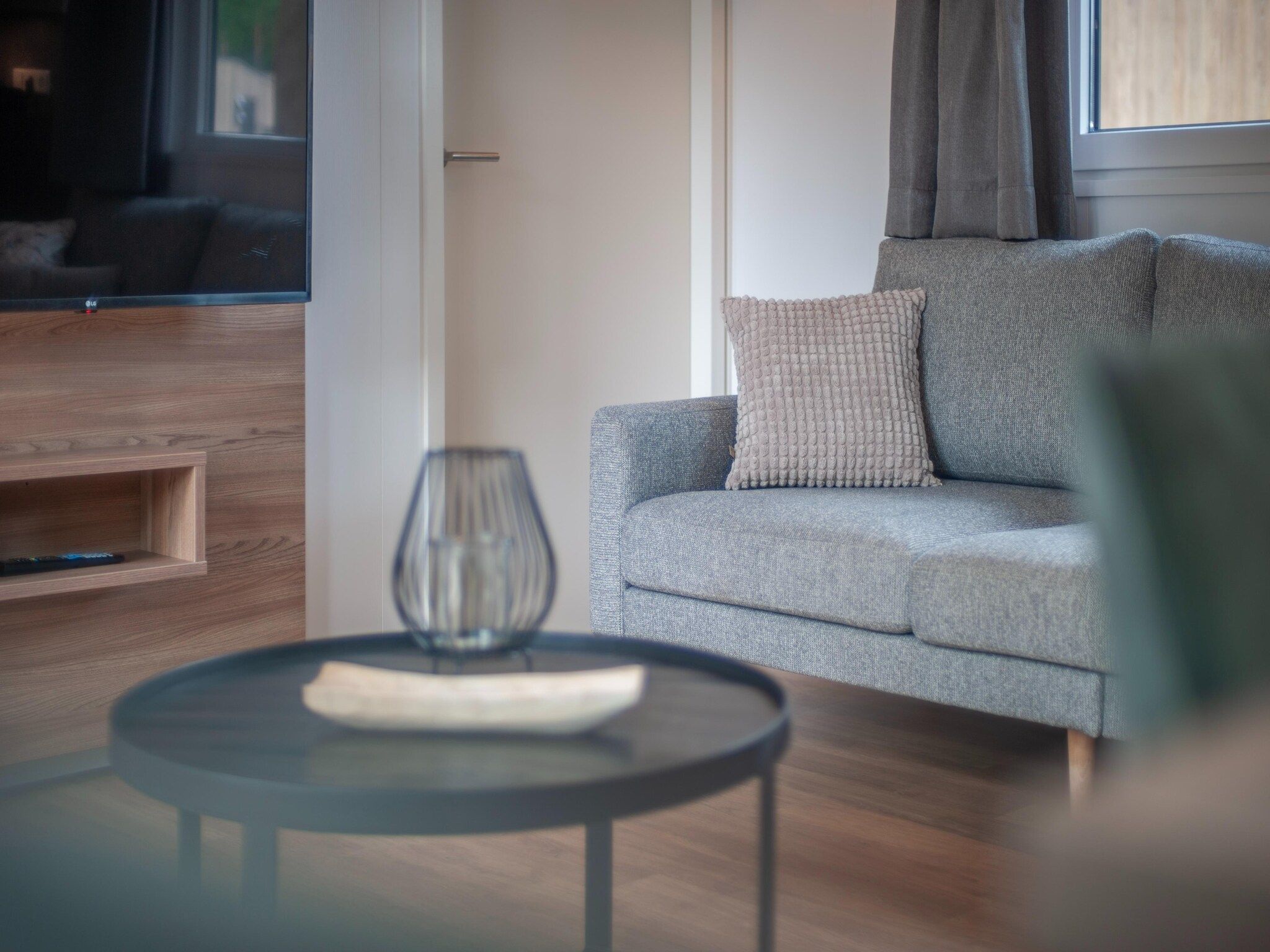 De woonkamer van Bospark 't Wolfsven 20 in Mierlo