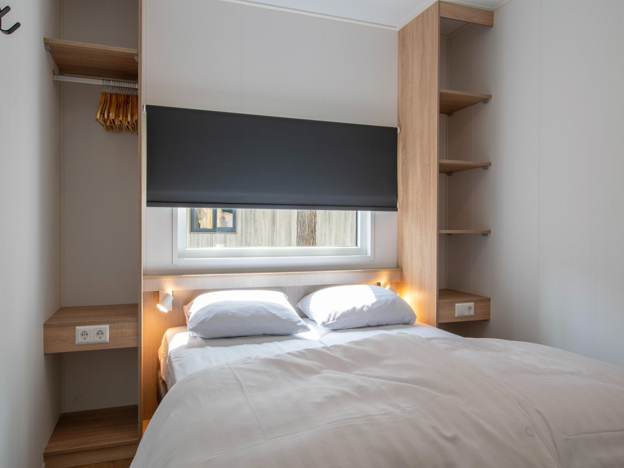 Een slaapkamer van Bospark 't Wolfsven 20 in Mierlo