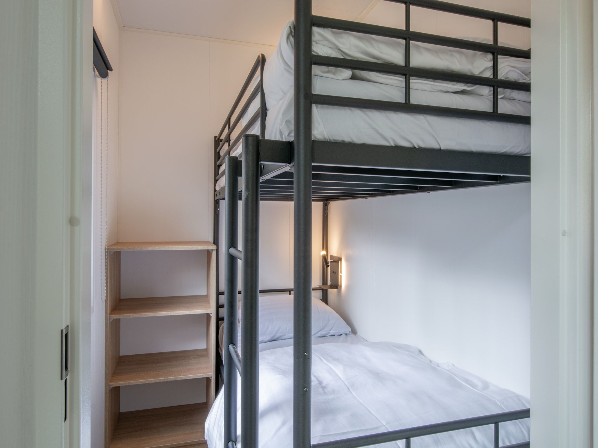 Een slaapkamer van Bospark 't Wolfsven 20 in Mierlo