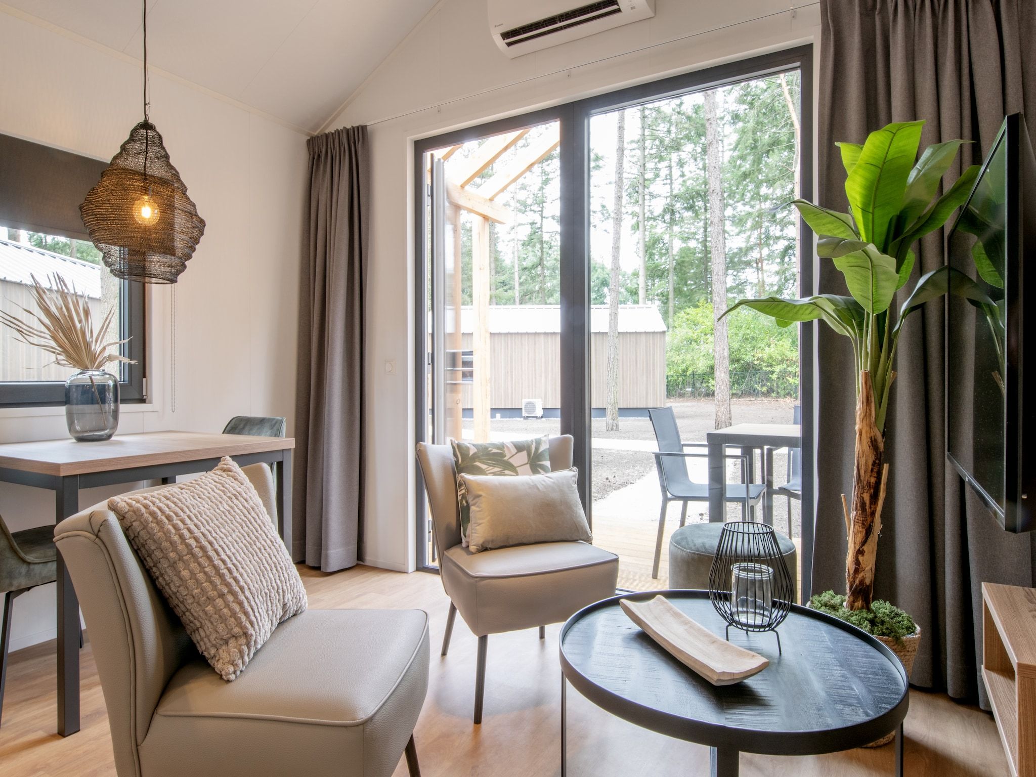 De woonkamer van Bospark 't Wolfsven 21 in Mierlo