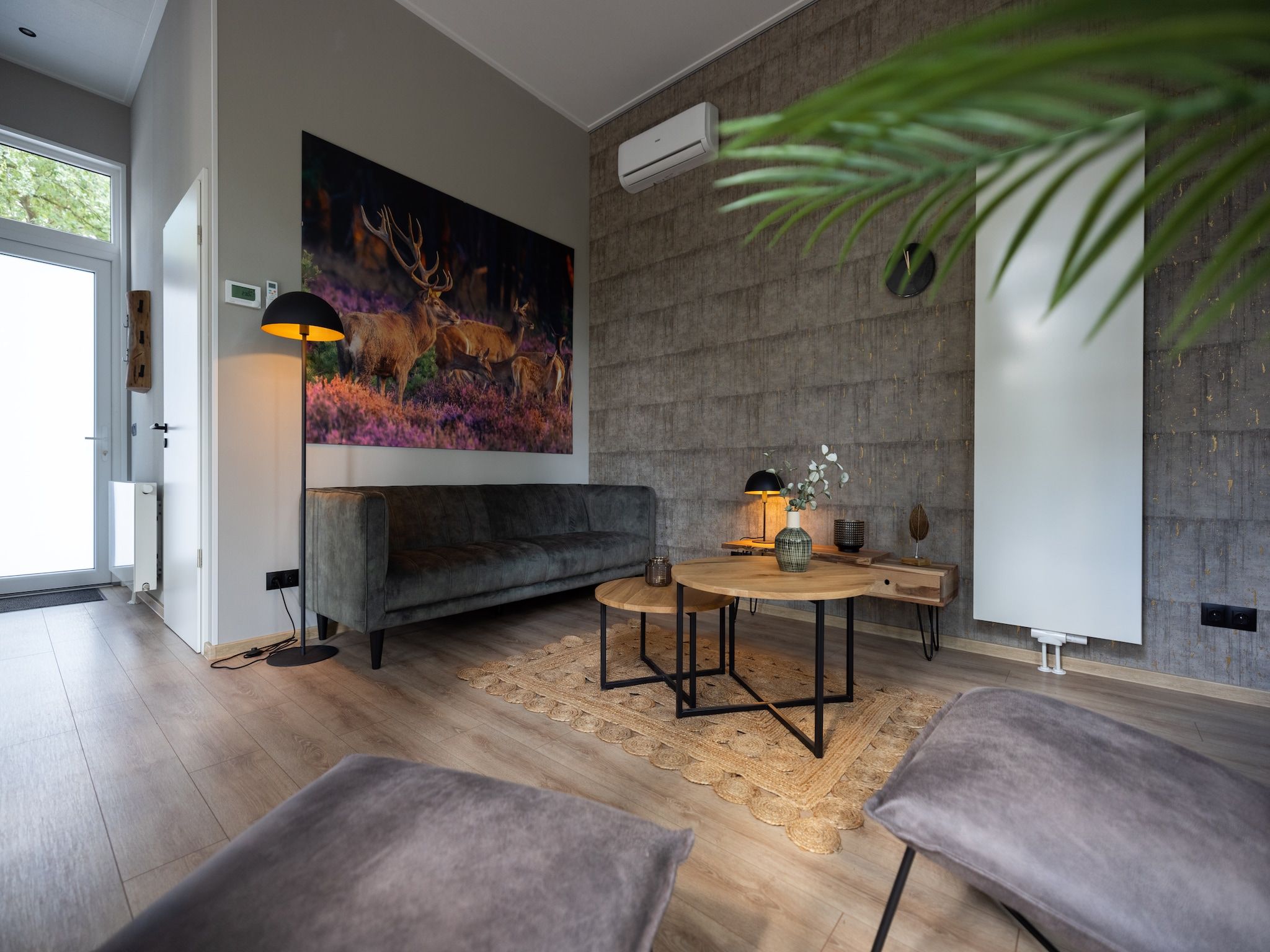 De woonkamer van Vakantiepark De Rimboe & De Woeste Hoogte 40 in Hoenderloo