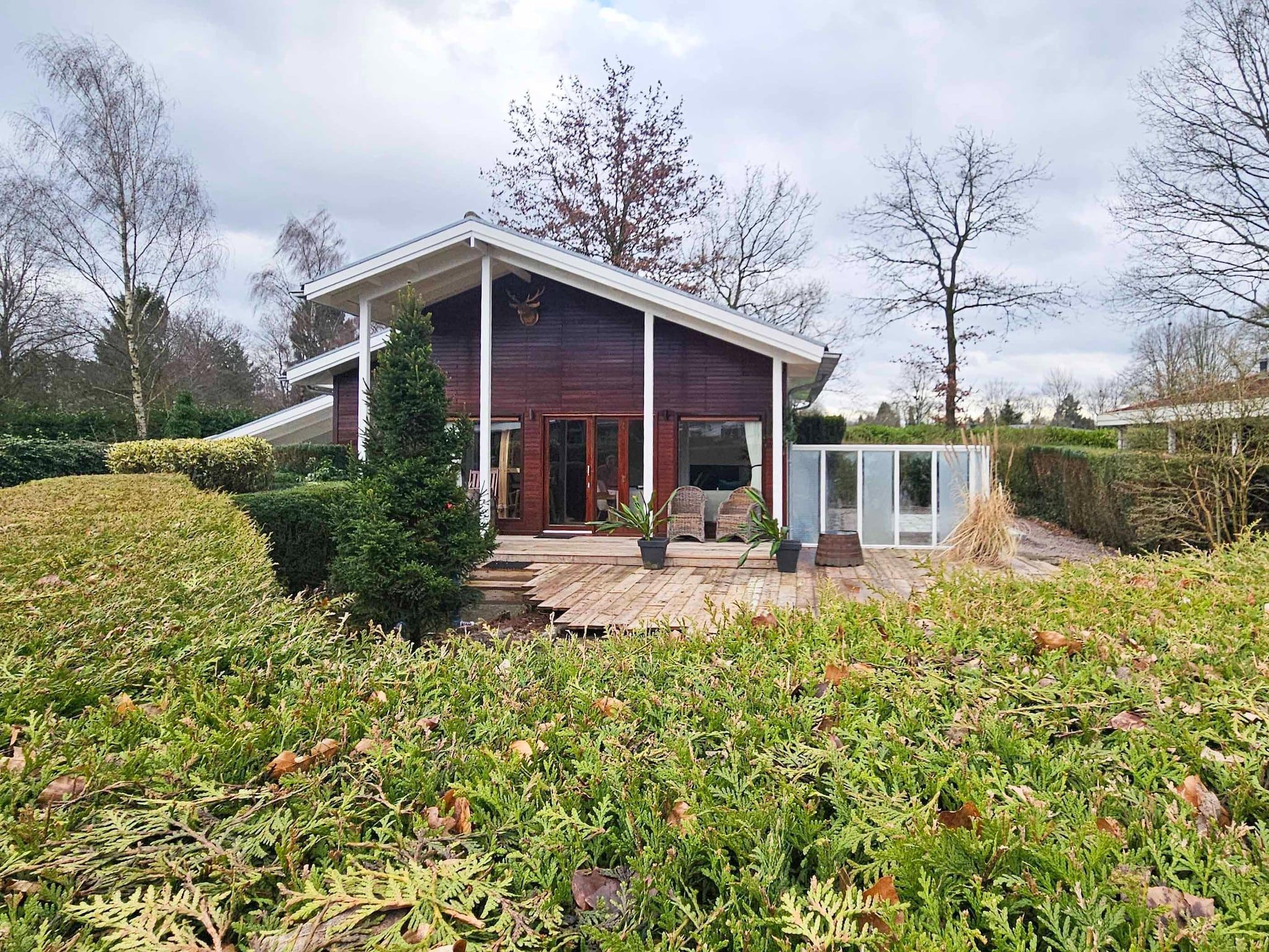 De tuin van Chalet Kieftveen Voorthuizen II 4 pax -817 in Voorthuizen