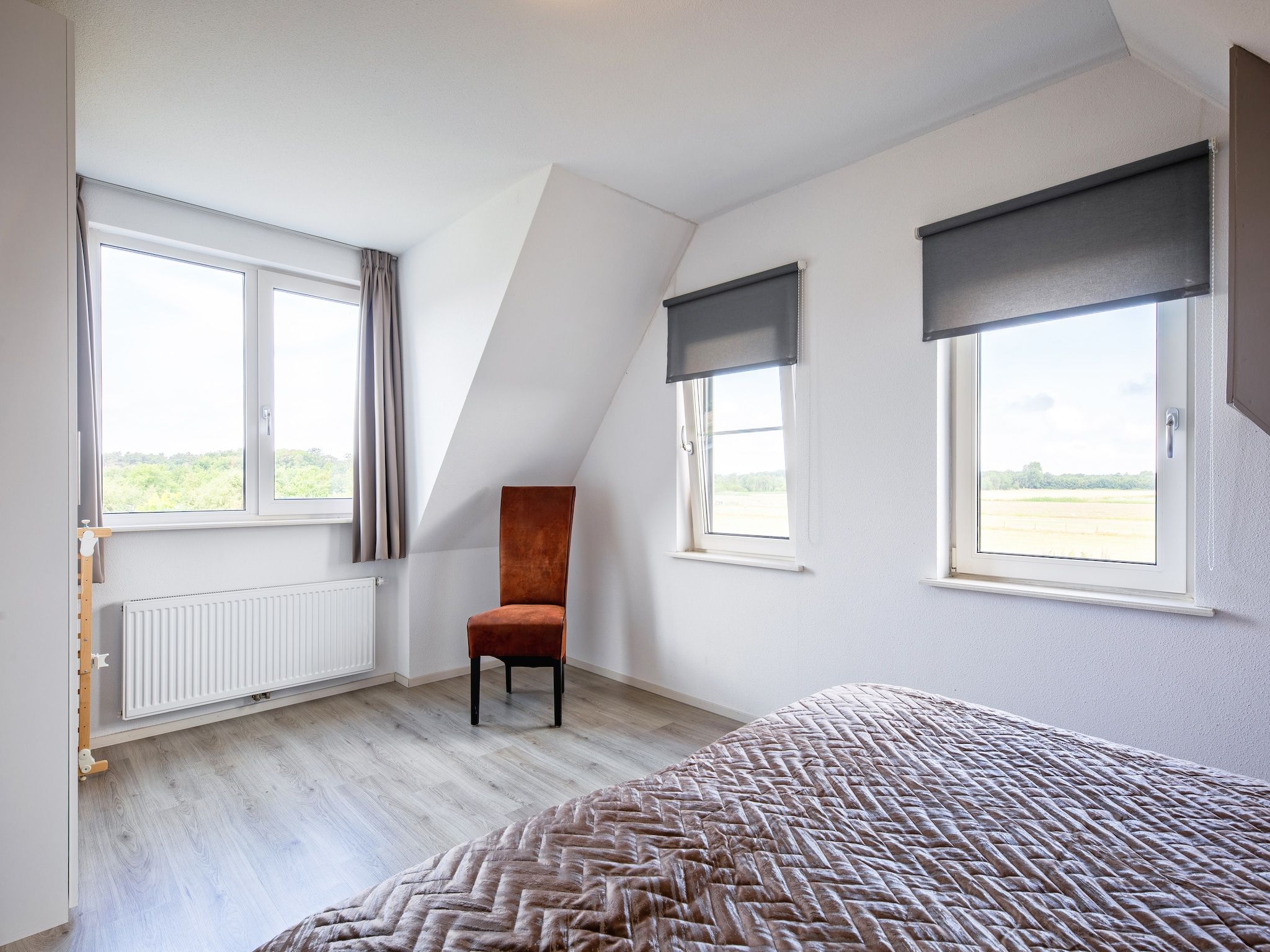 Een slaapkamer van Wulpenweid 12A in Den Burg