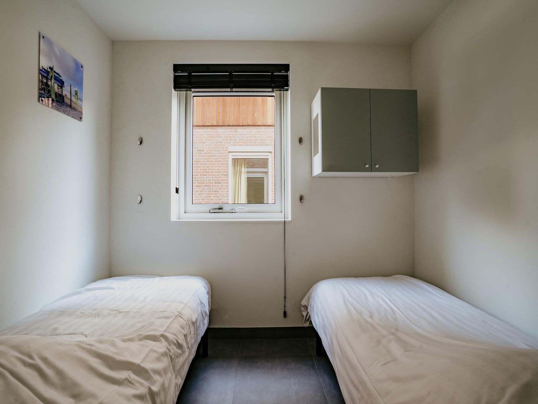 Een slaapkamer van Waterpark de Meerparel 13 in Uitgeest