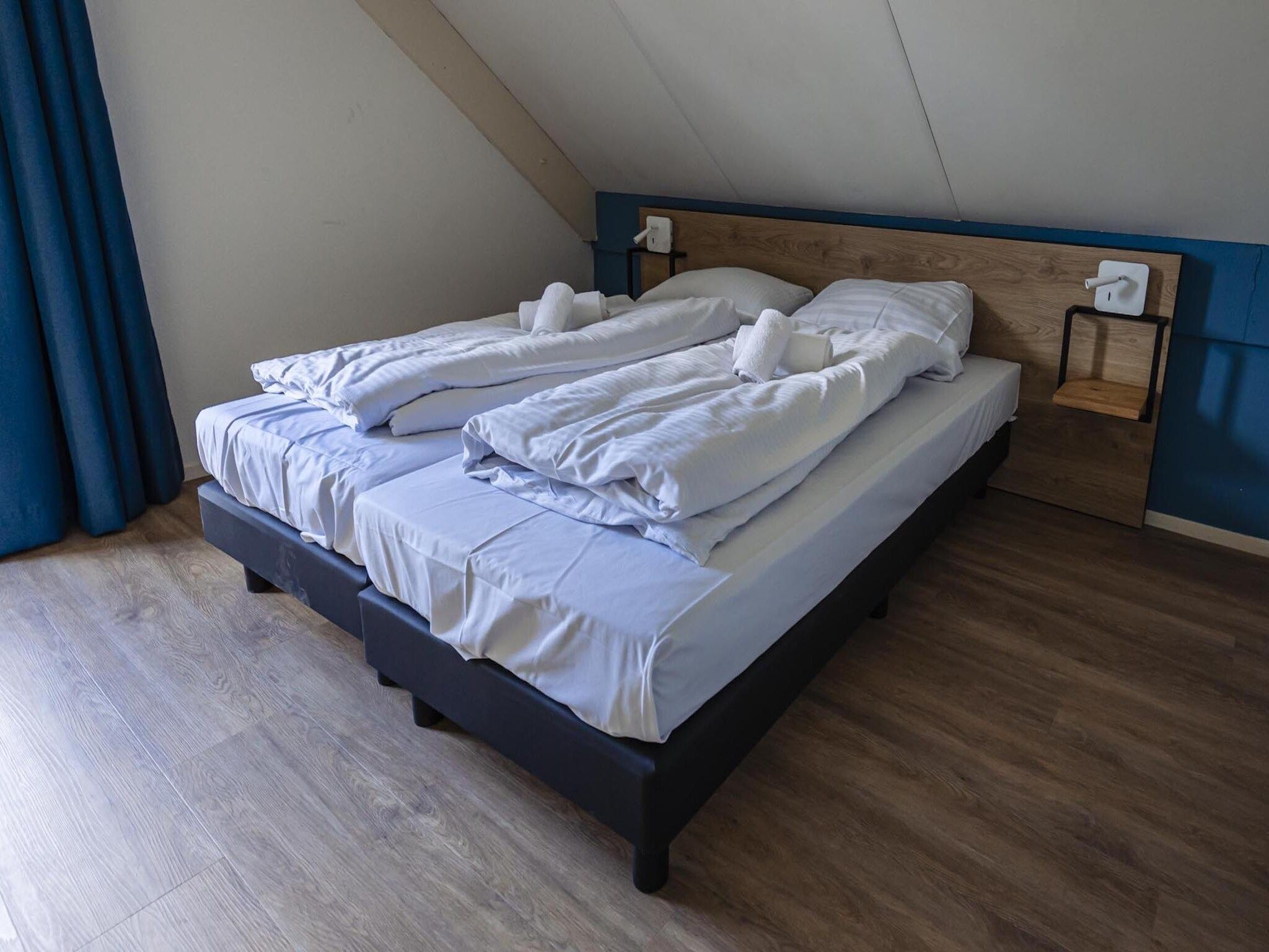 Een slaapkamer van Vakantiepark 't Broeckhuys 6 in Ewijk