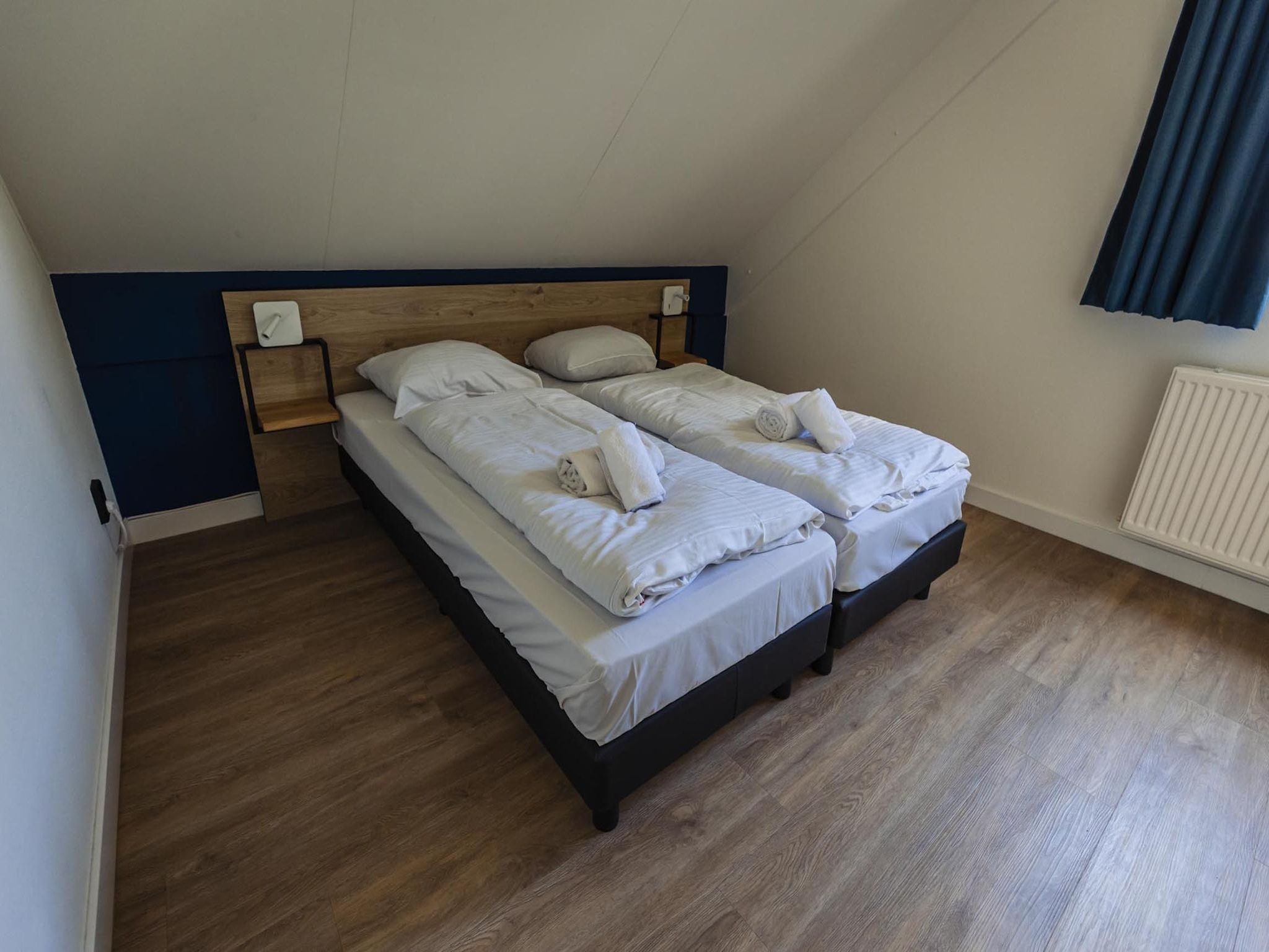 Een slaapkamer van Vakantiepark 't Broeckhuys 8 in Ewijk