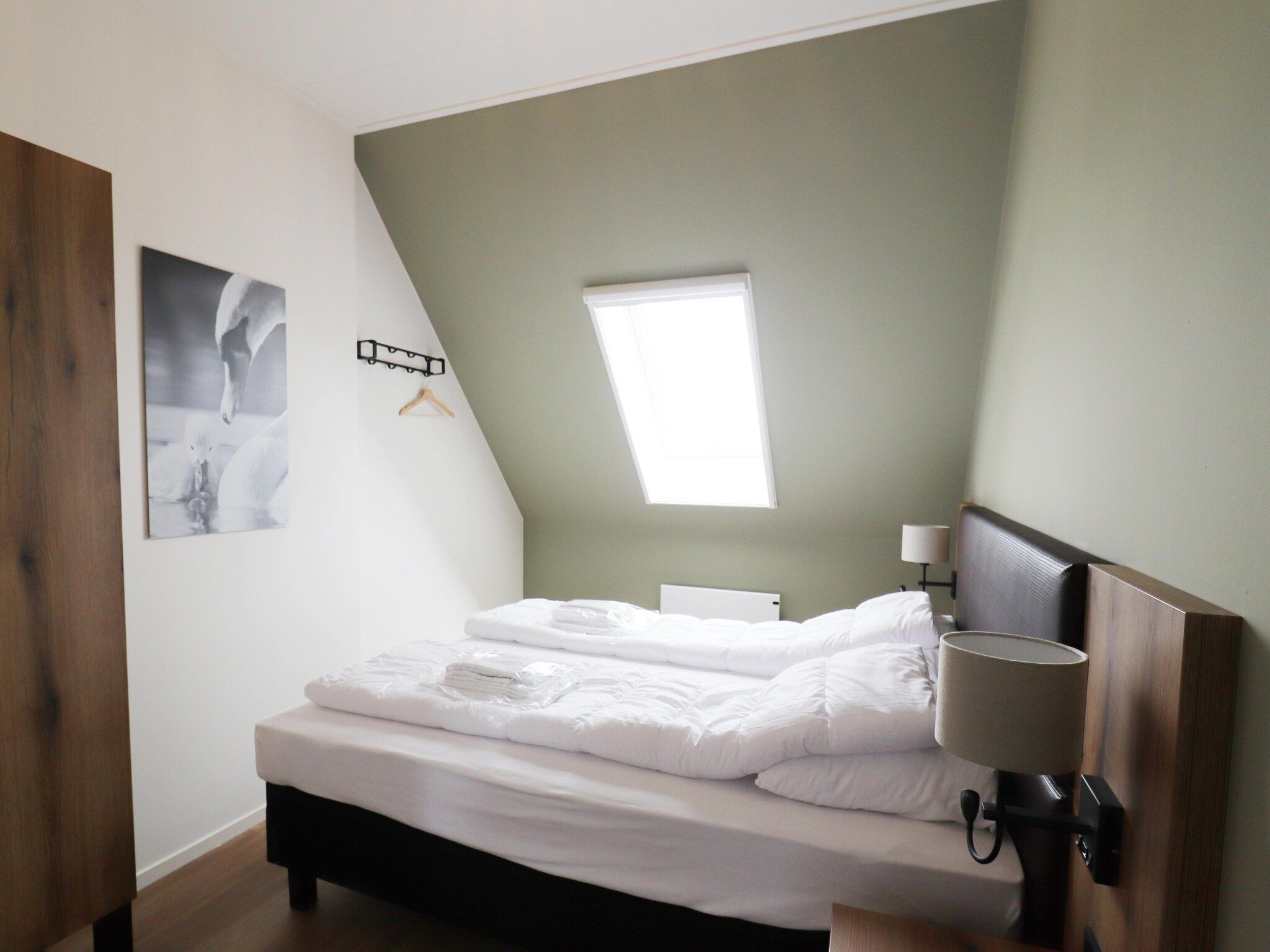 Een slaapkamer van Friese Villa 6 pers met sloep optioneel bij te boeken in Leons