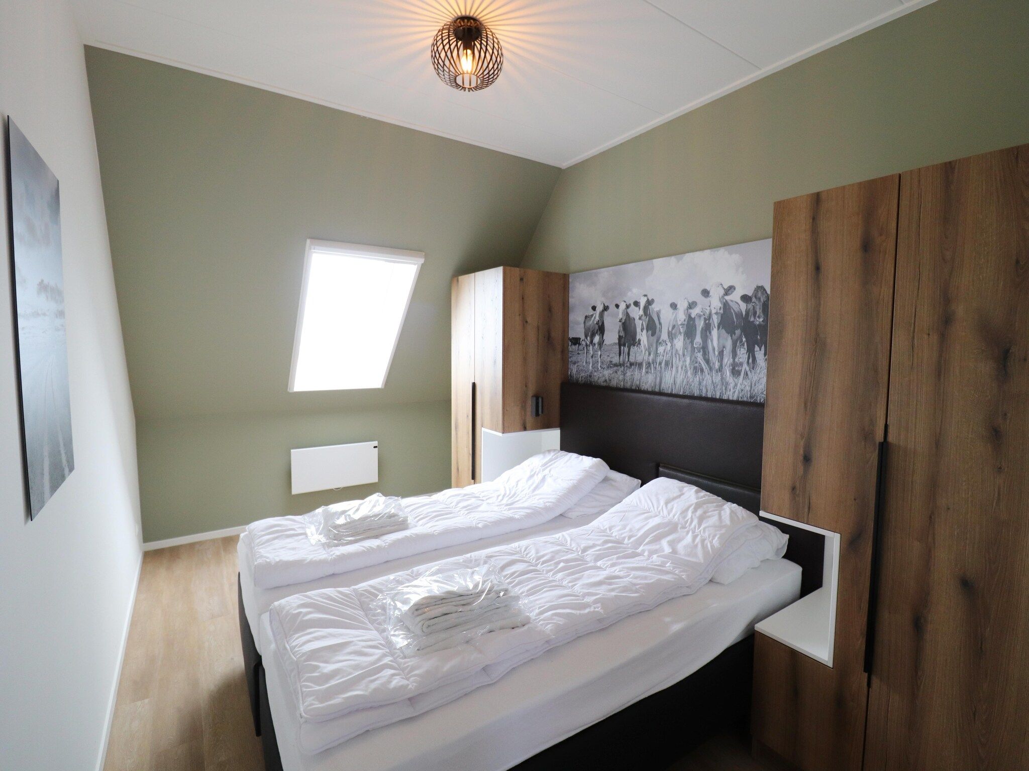 Een slaapkamer van Friese Villa 6 pers met sloep optioneel bij te boeken in Leons