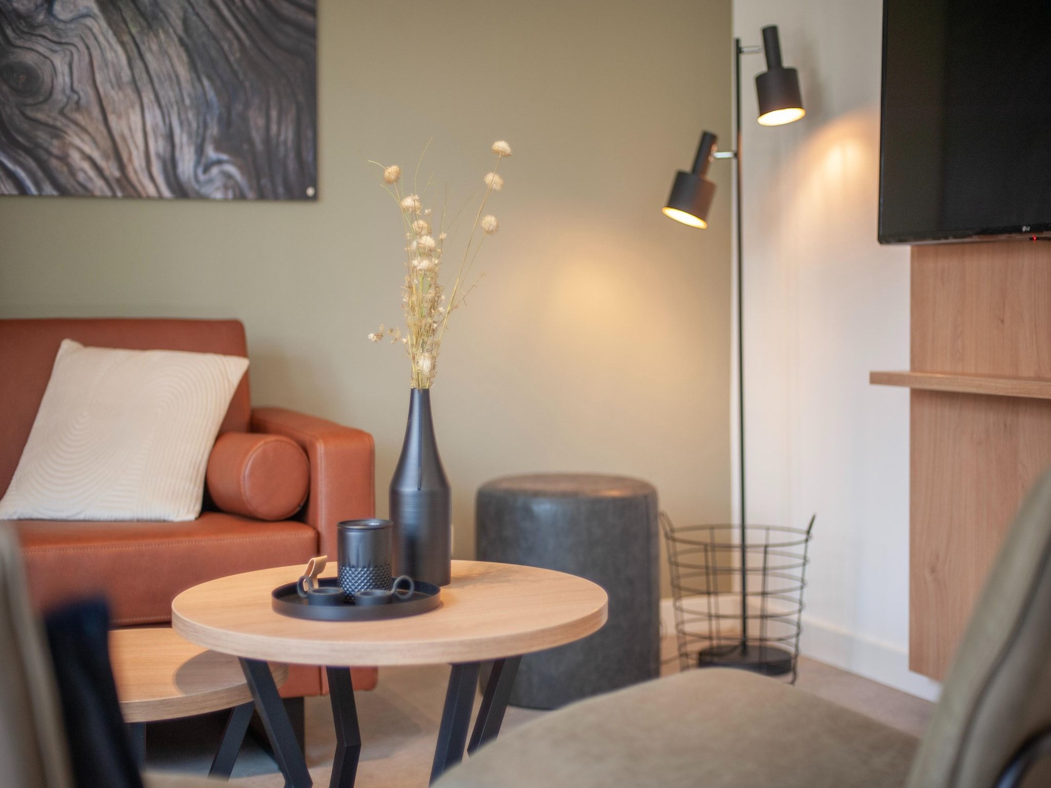 De woonkamer van Vakantiepark de Katjeskelder 24 in Oosterhout