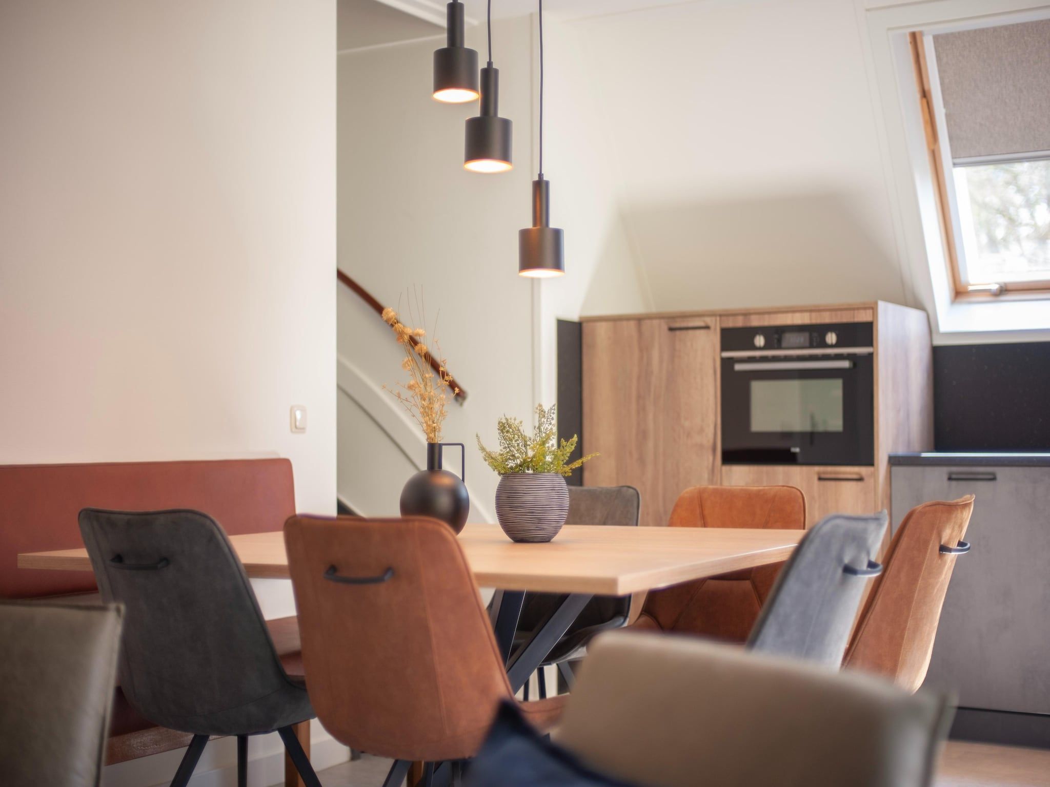 De eetkamer van Vakantiepark de Katjeskelder 24 in Oosterhout