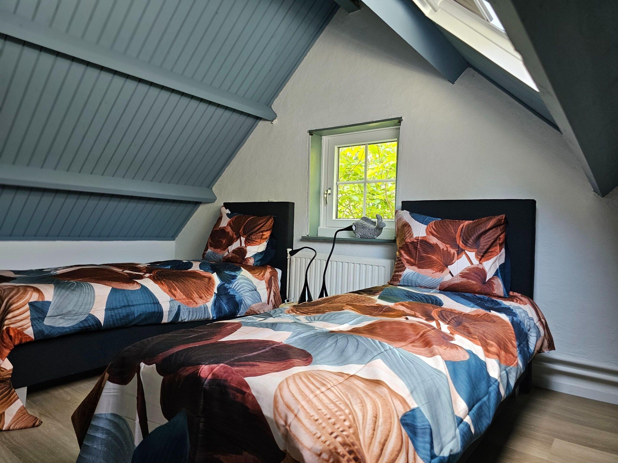 Een slaapkamer van Dorpswoning Het Tolhuis in Leende