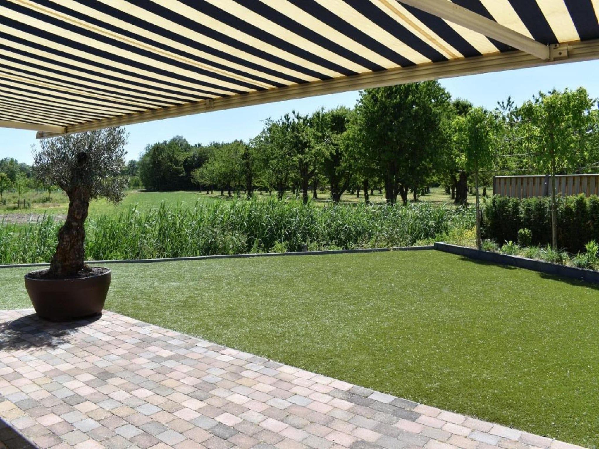 Het uitzicht vanaf Villa Bosrijk in Zeewolde