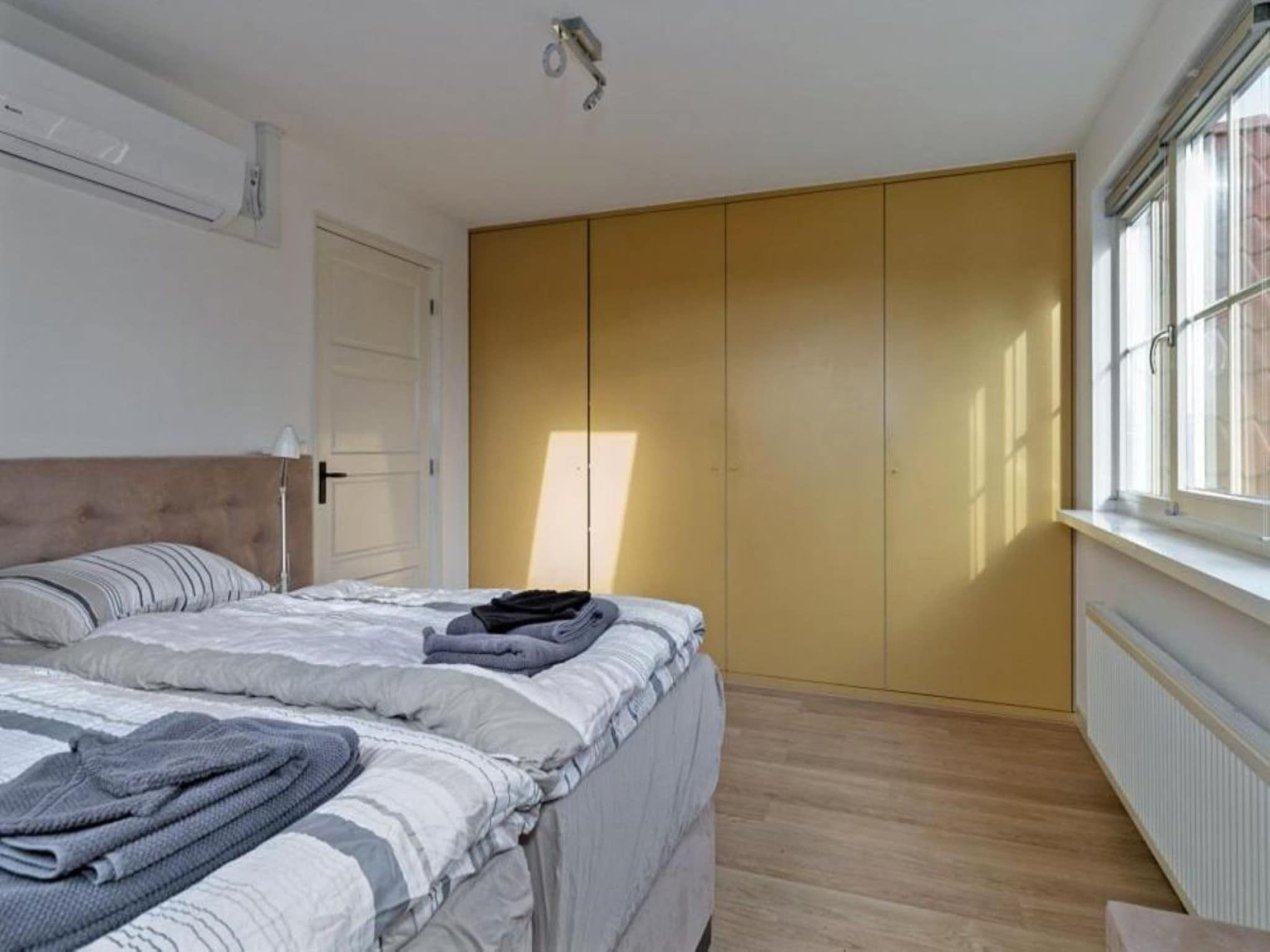 Een slaapkamer van Villa Bosrijk in Zeewolde