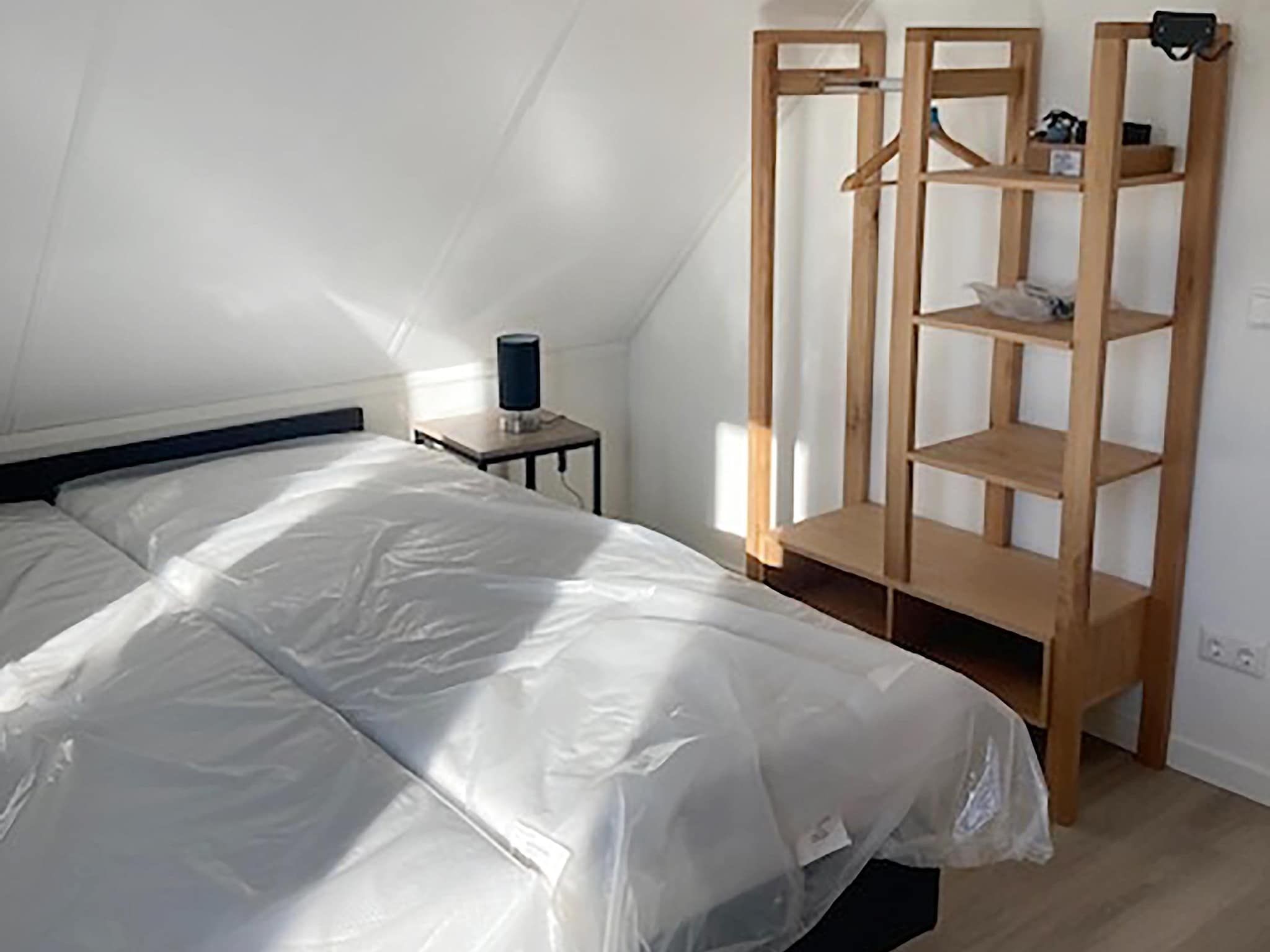 Een slaapkamer van Kuifduiker 124 in Simonshaven