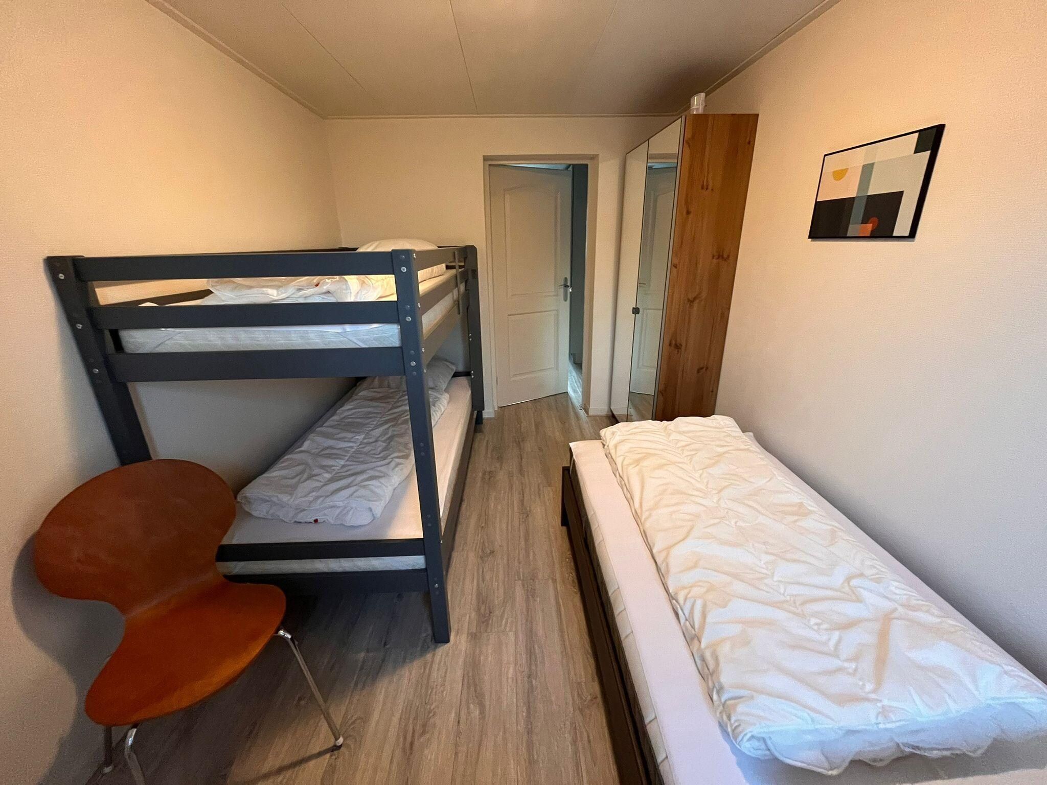 Een slaapkamer van Fijne bungalow in Makkum in Friesland