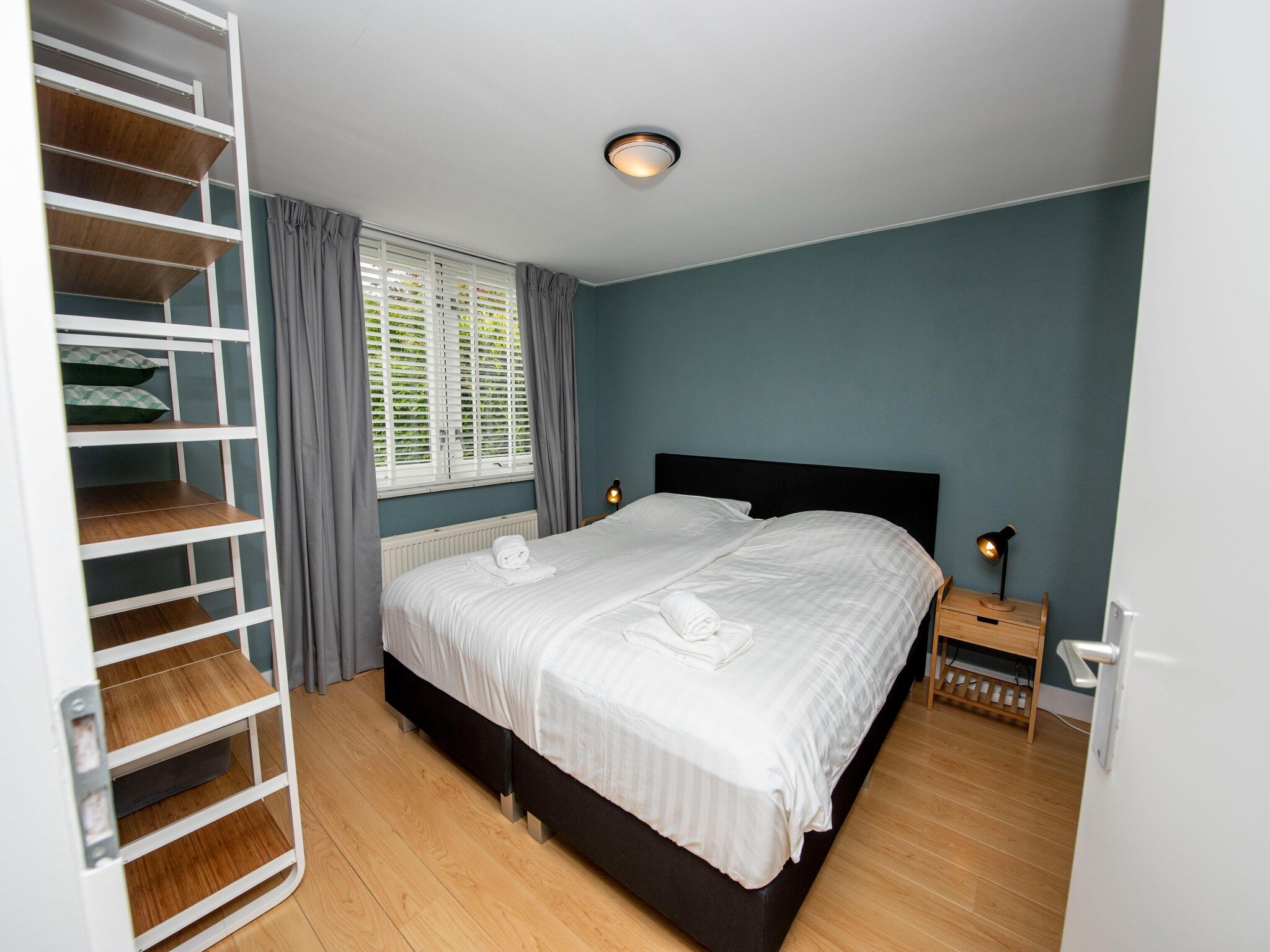 Een slaapkamer van Villa aan het water in Terherne in Terherne