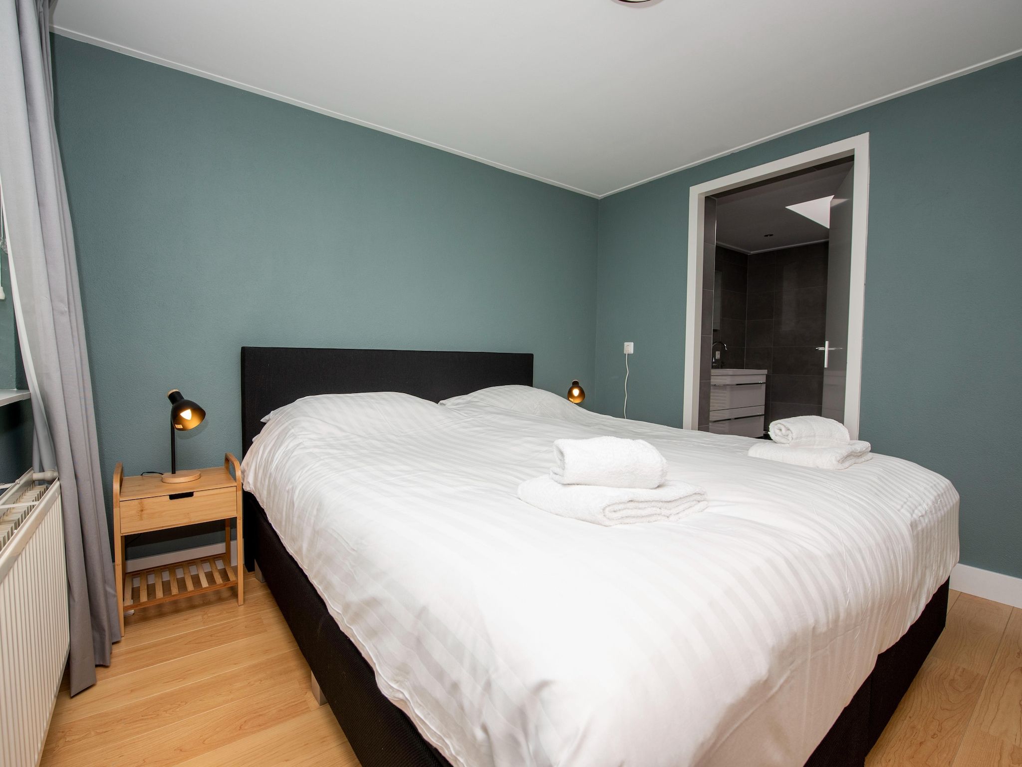 Een slaapkamer van Villa aan het water in Terherne in Terherne