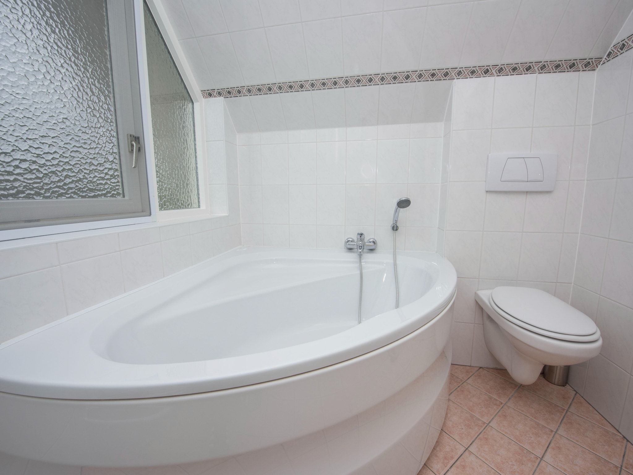 De badkamer van Villa aan het water in Terherne in Terherne