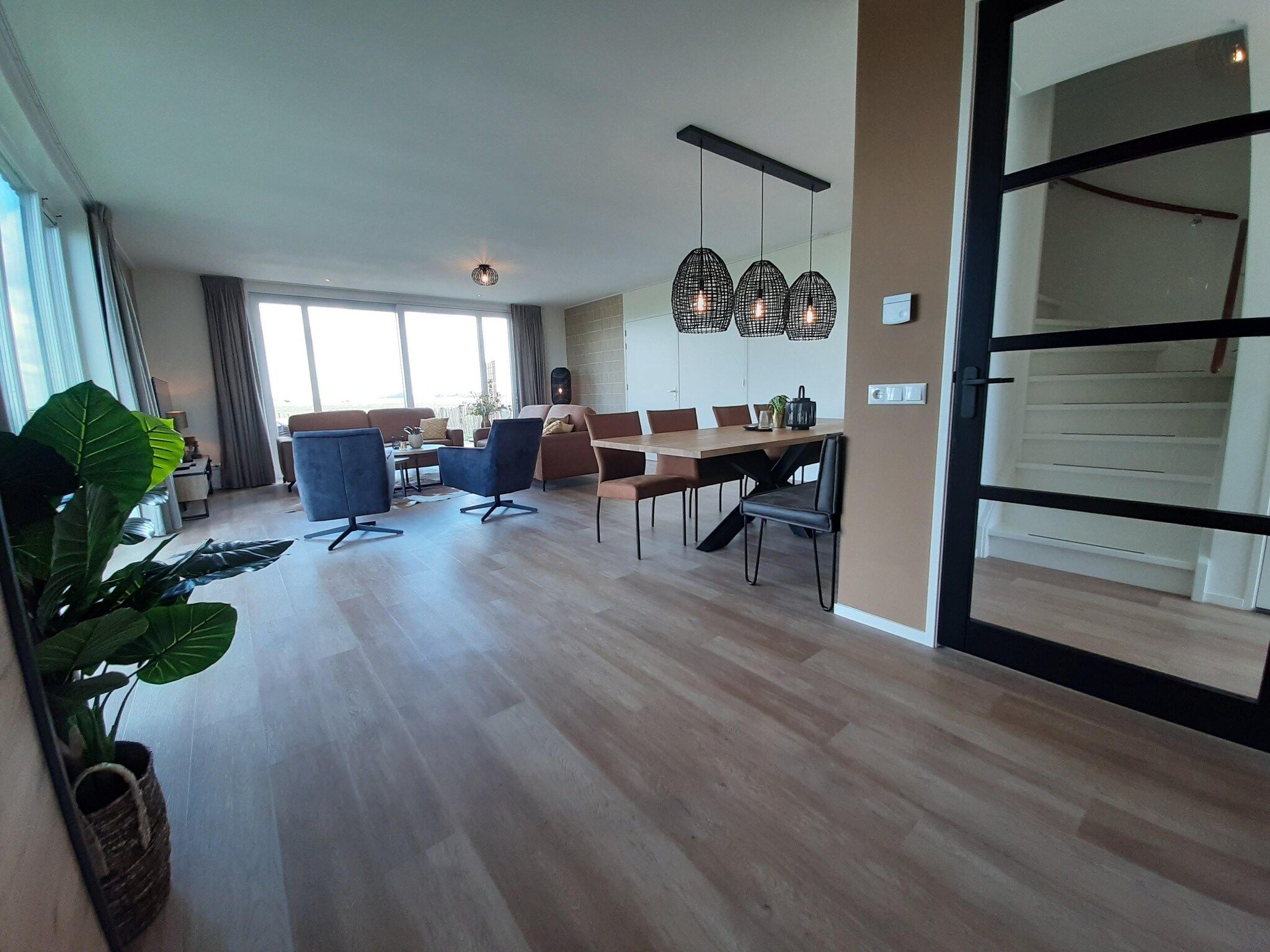 De woonkamer van 20 persoons villa in Leons