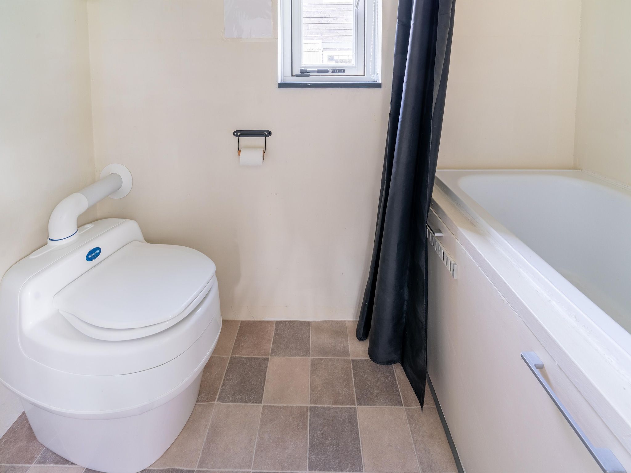 De badkamer van Tiny House in Burgerbrug