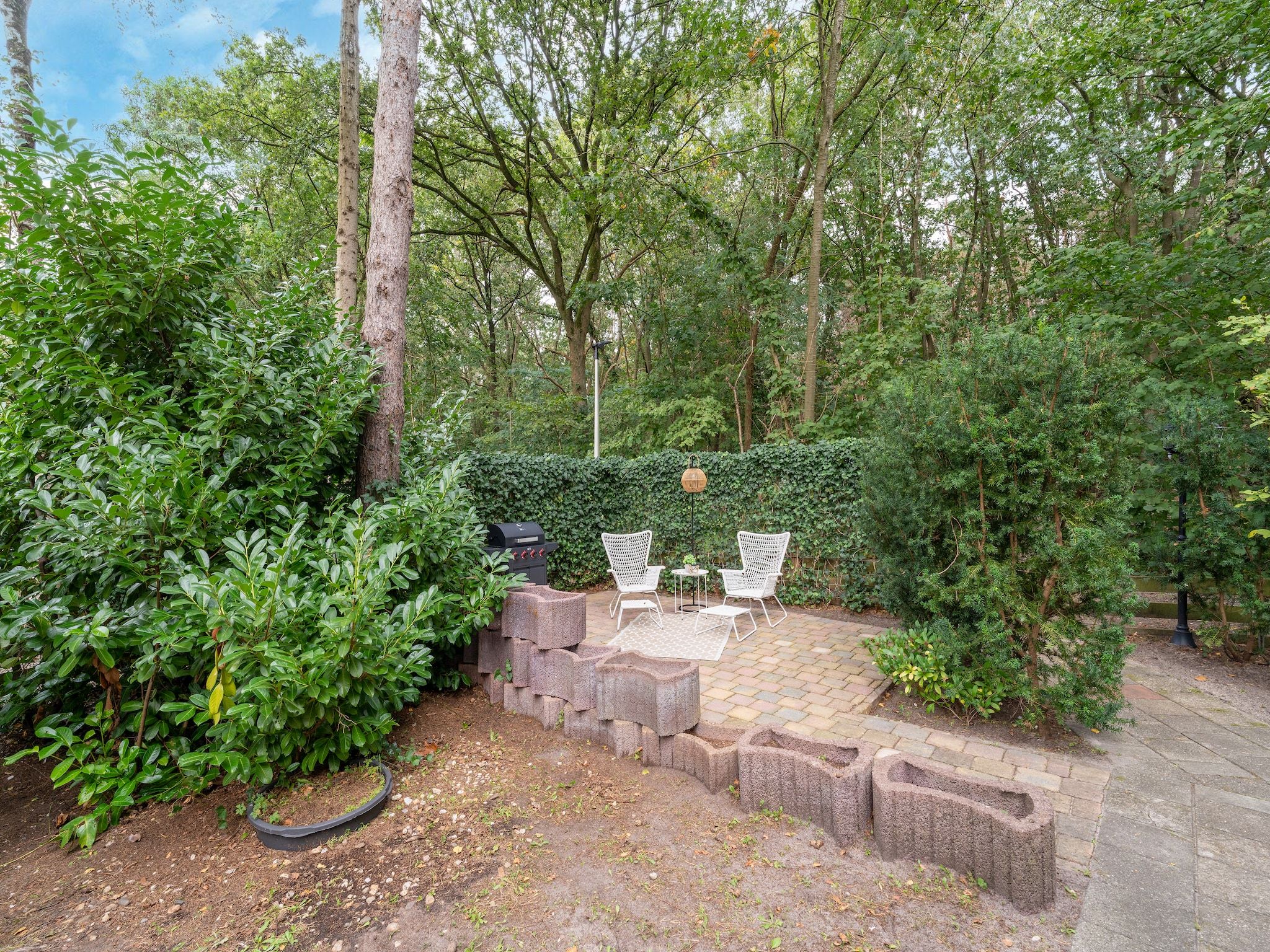 De tuin van Boshuisje Joy in Gelderland