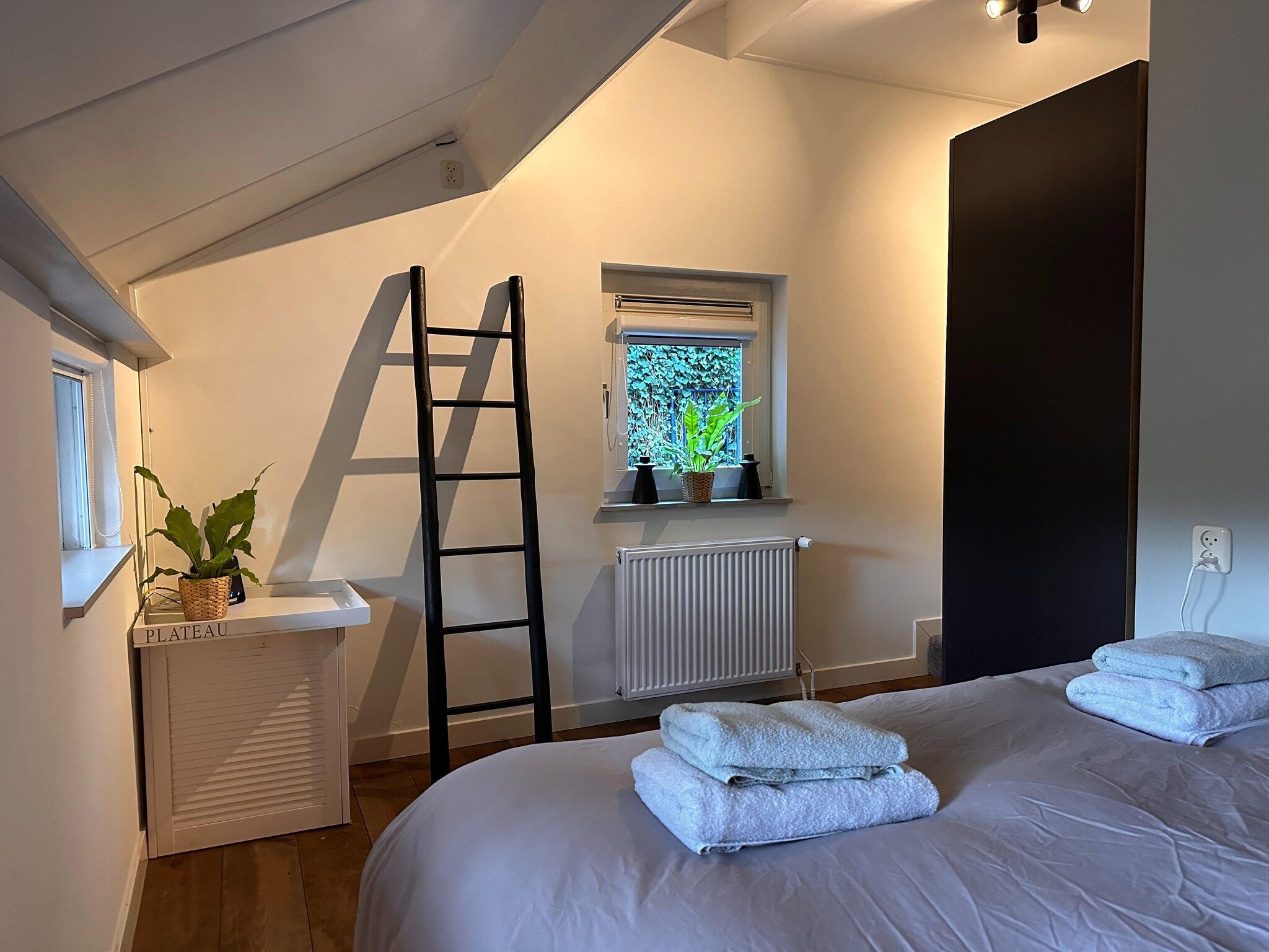 Een slaapkamer van Vakantiewoning het Bakhuis Zeumershof 4 pax in Voorthuizen