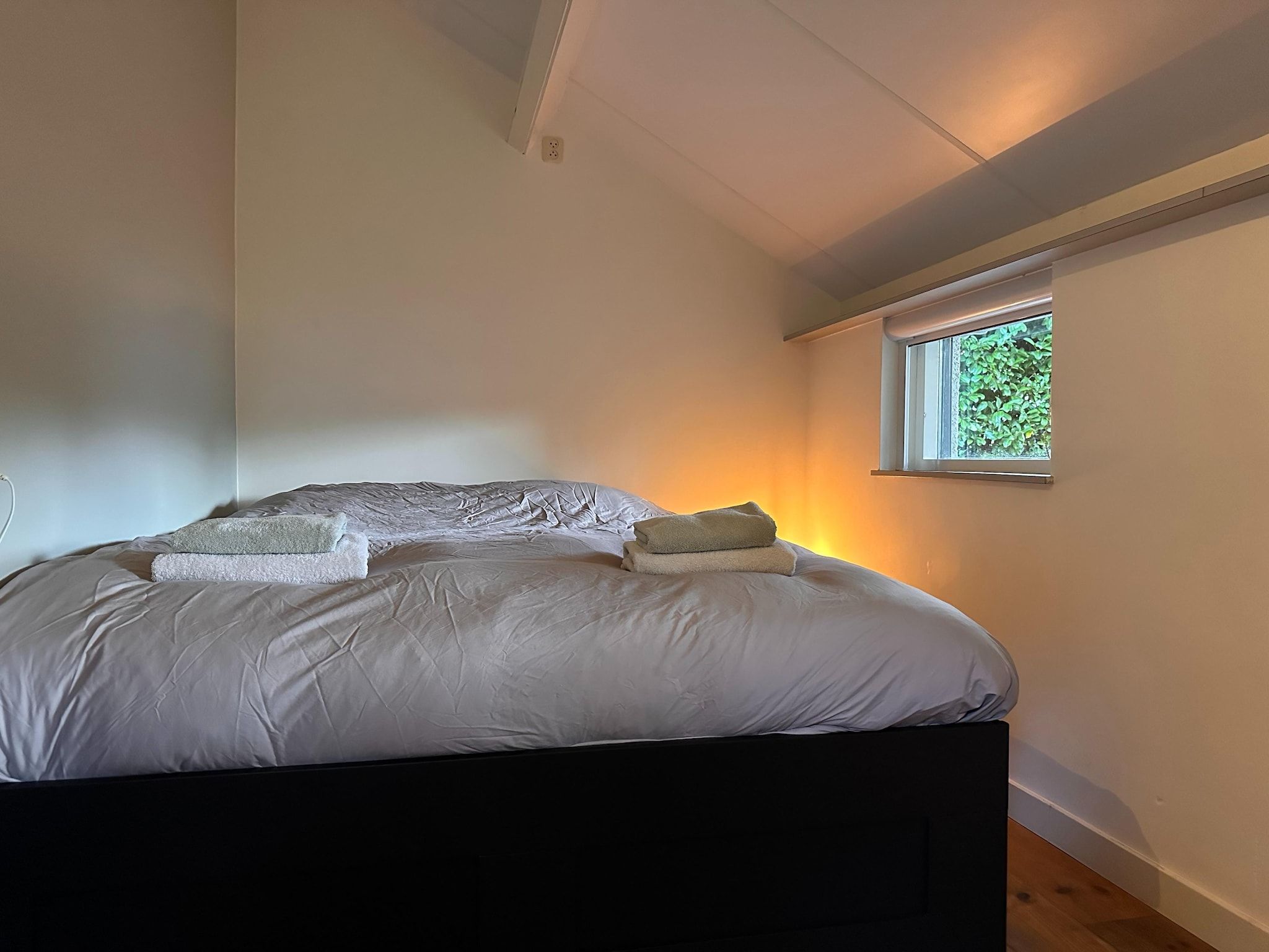 Een slaapkamer van Vakantiewoning het Bakhuis Zeumershof 4 pax in Voorthuizen