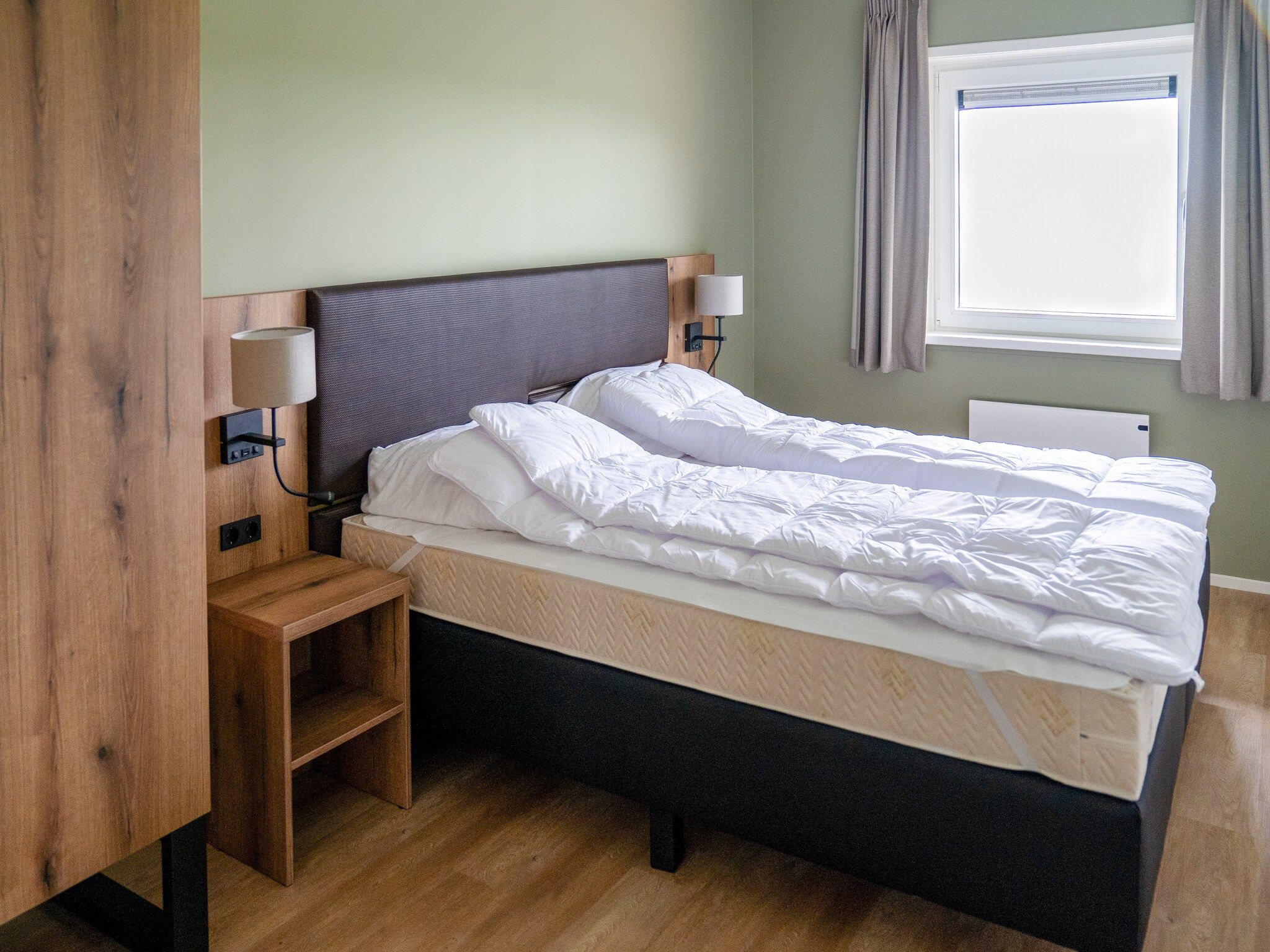 Een slaapkamer van 20 persoons villa in Leons