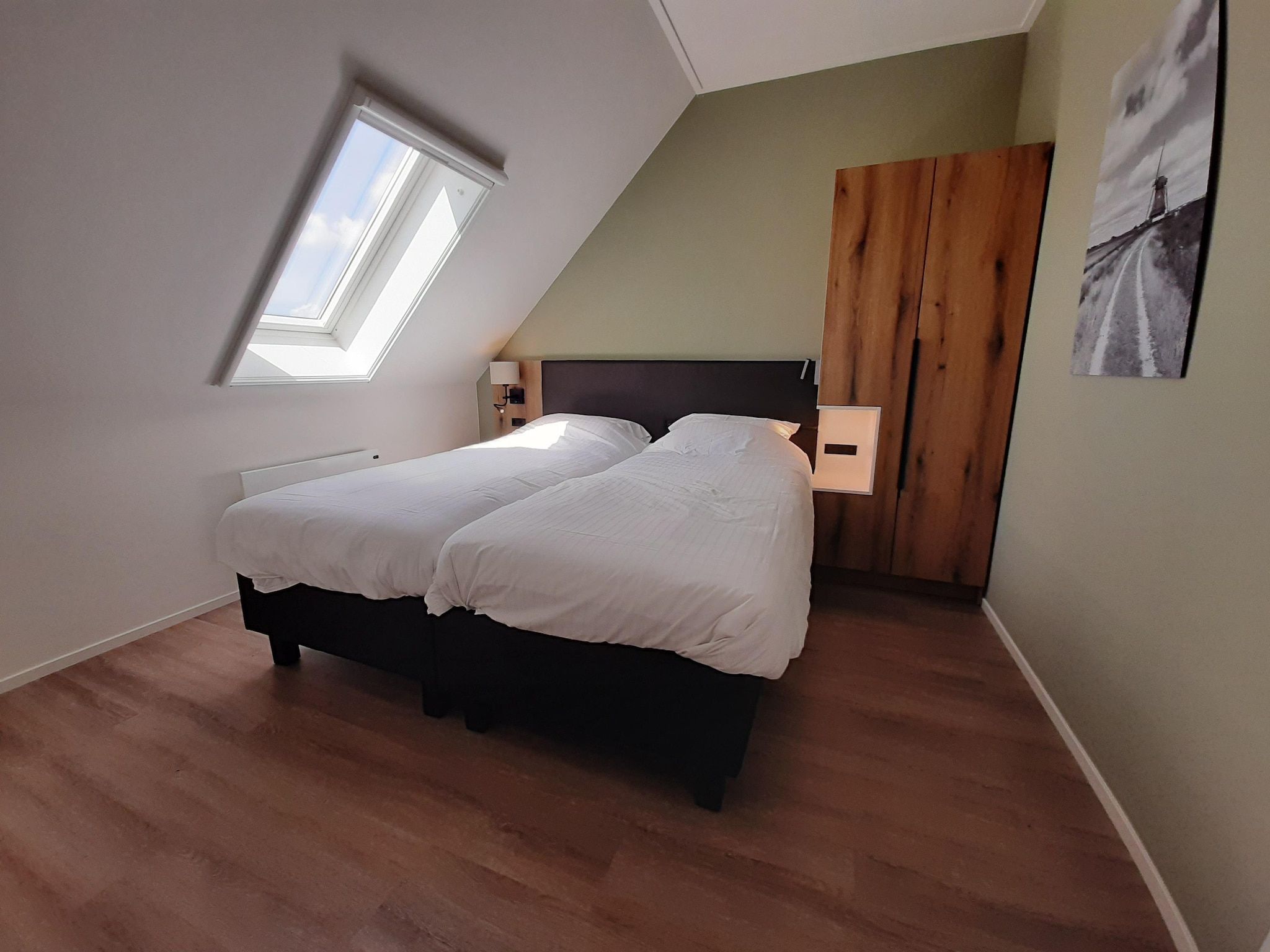 Een slaapkamer van 20 persoons villa in Leons