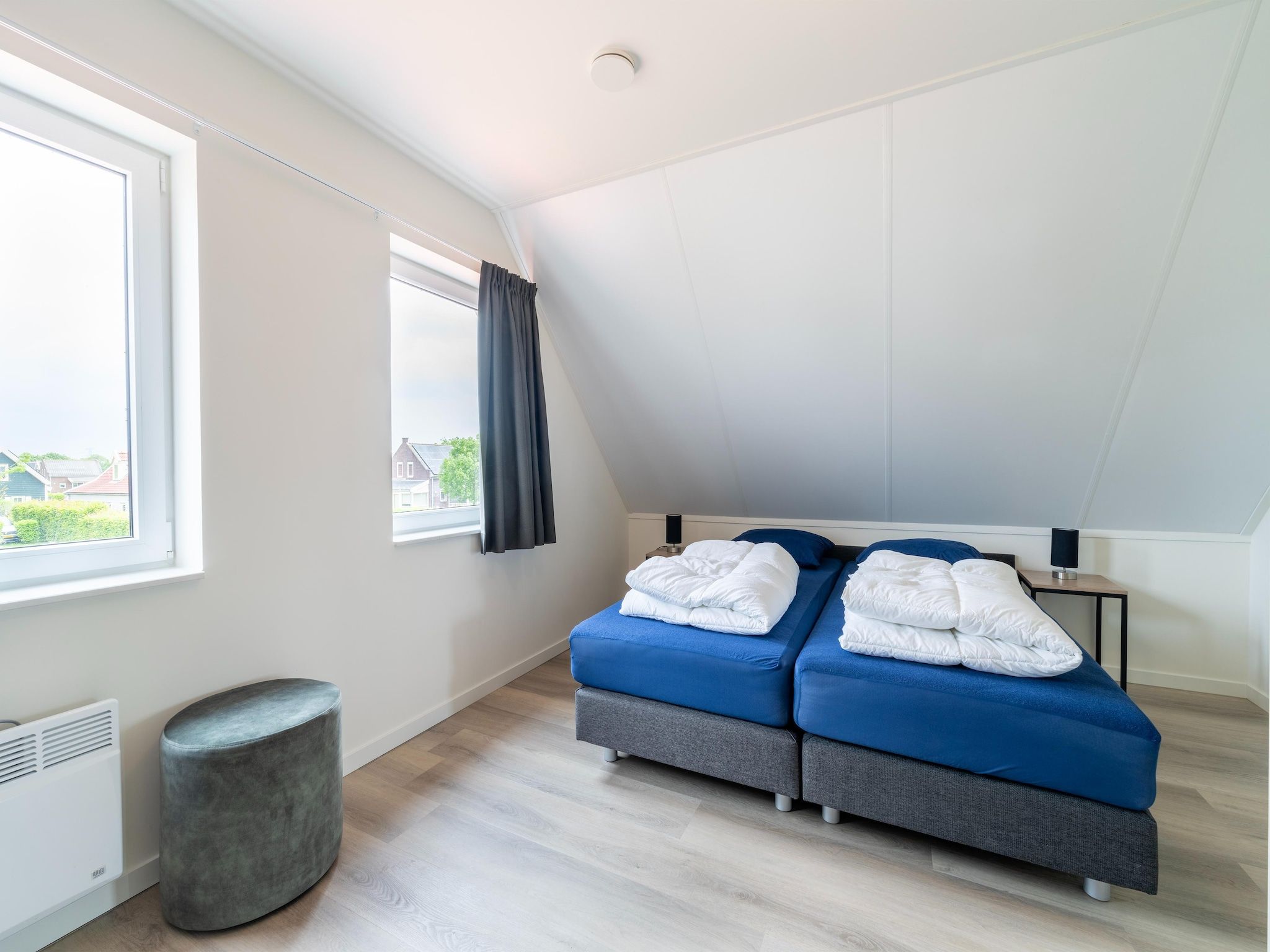 Een slaapkamer van Strandloper 129 in Simonshaven