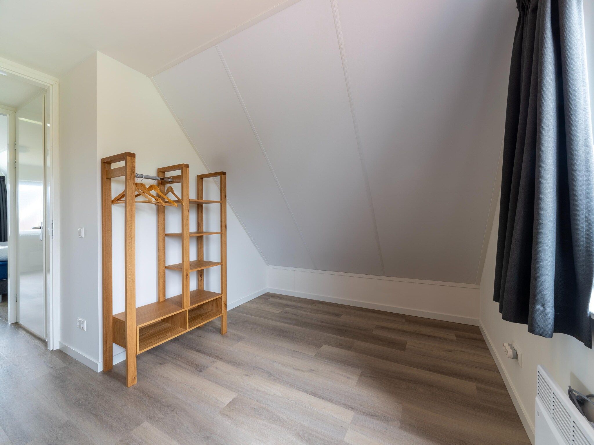 Een slaapkamer van Strandloper 129 in Simonshaven