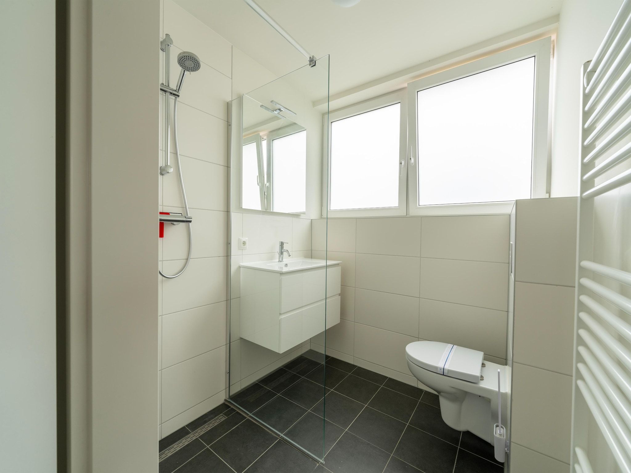 De badkamer van Strandloper 129 in Simonshaven