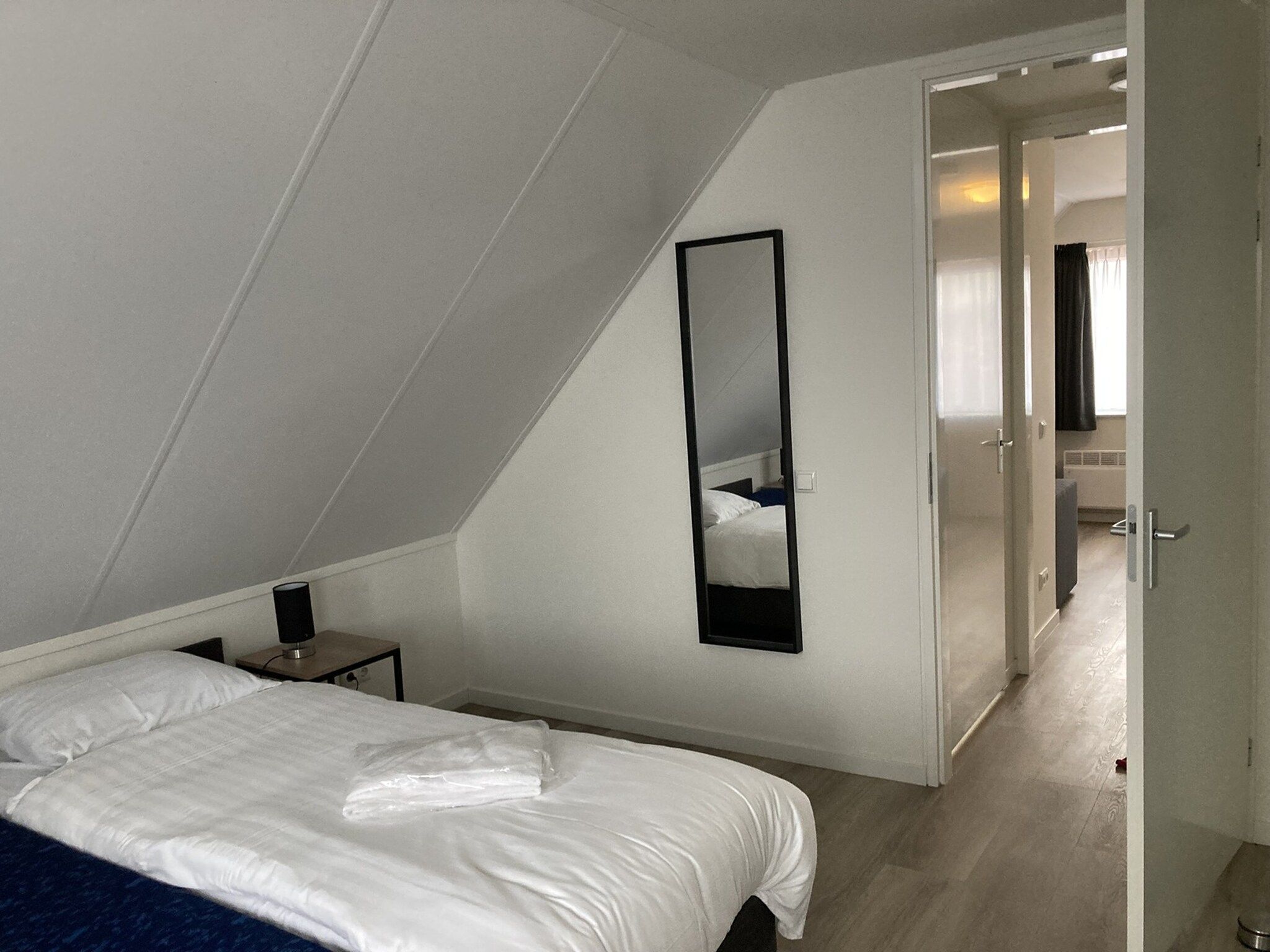 Een slaapkamer van Strandloper 129 in Simonshaven