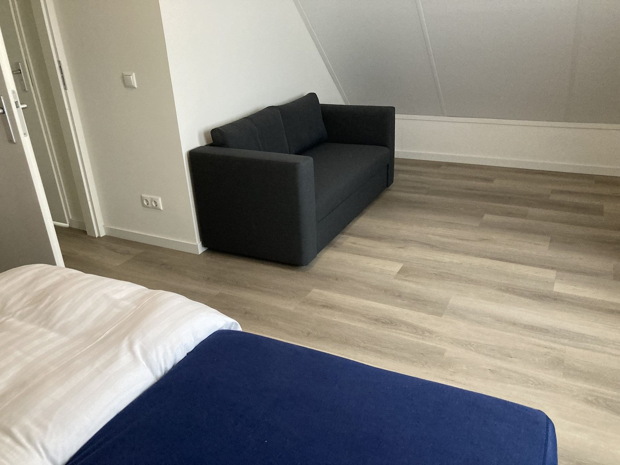 Een slaapkamer van Strandloper 129 in Simonshaven