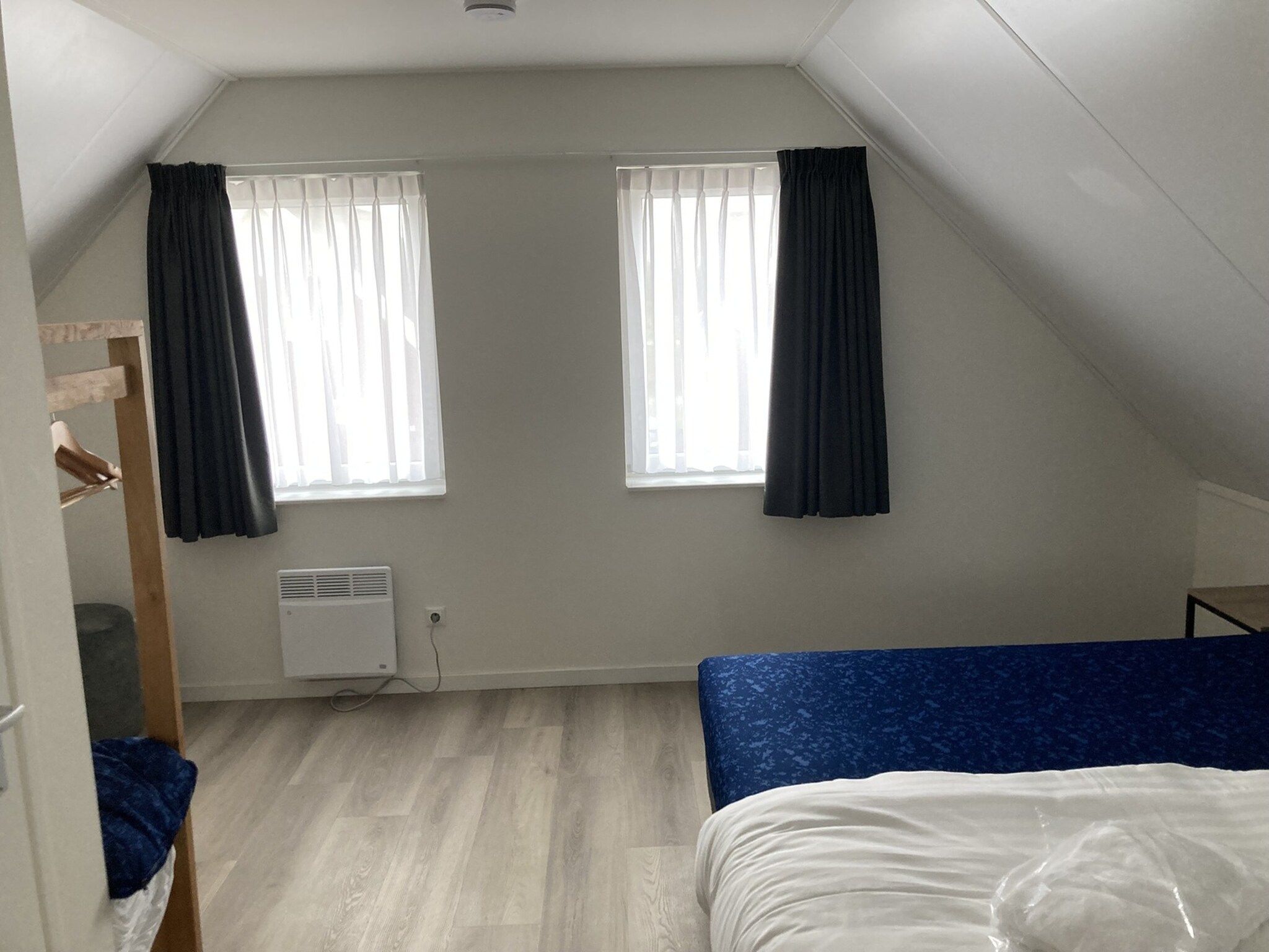 Een slaapkamer van Strandloper 129 in Simonshaven