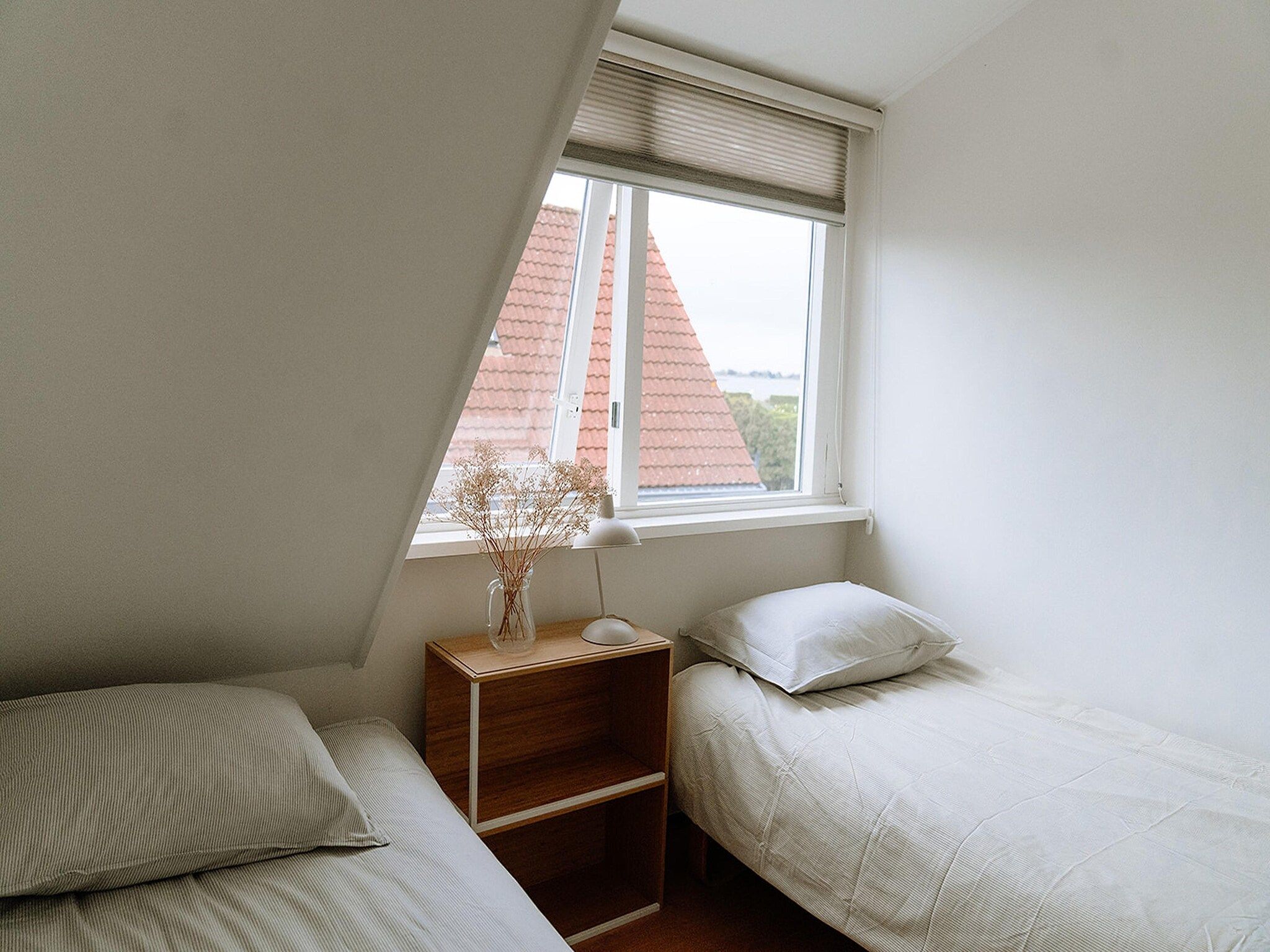 Een slaapkamer van De Wetterkant in Grou