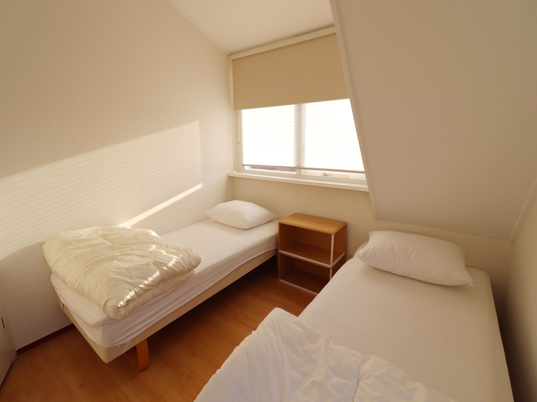 Een slaapkamer van De Wetterkant in Grou