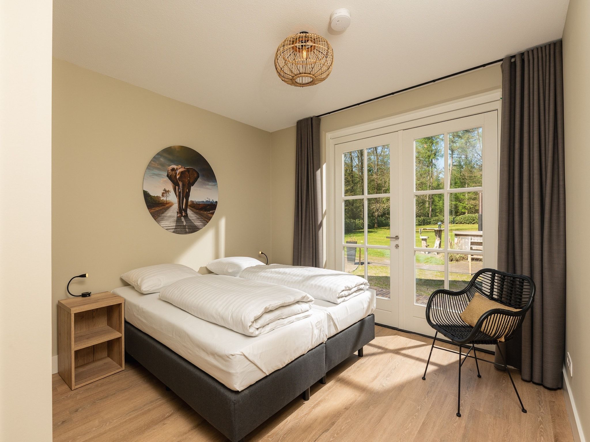 Een slaapkamer van Het Landhuis in Losser