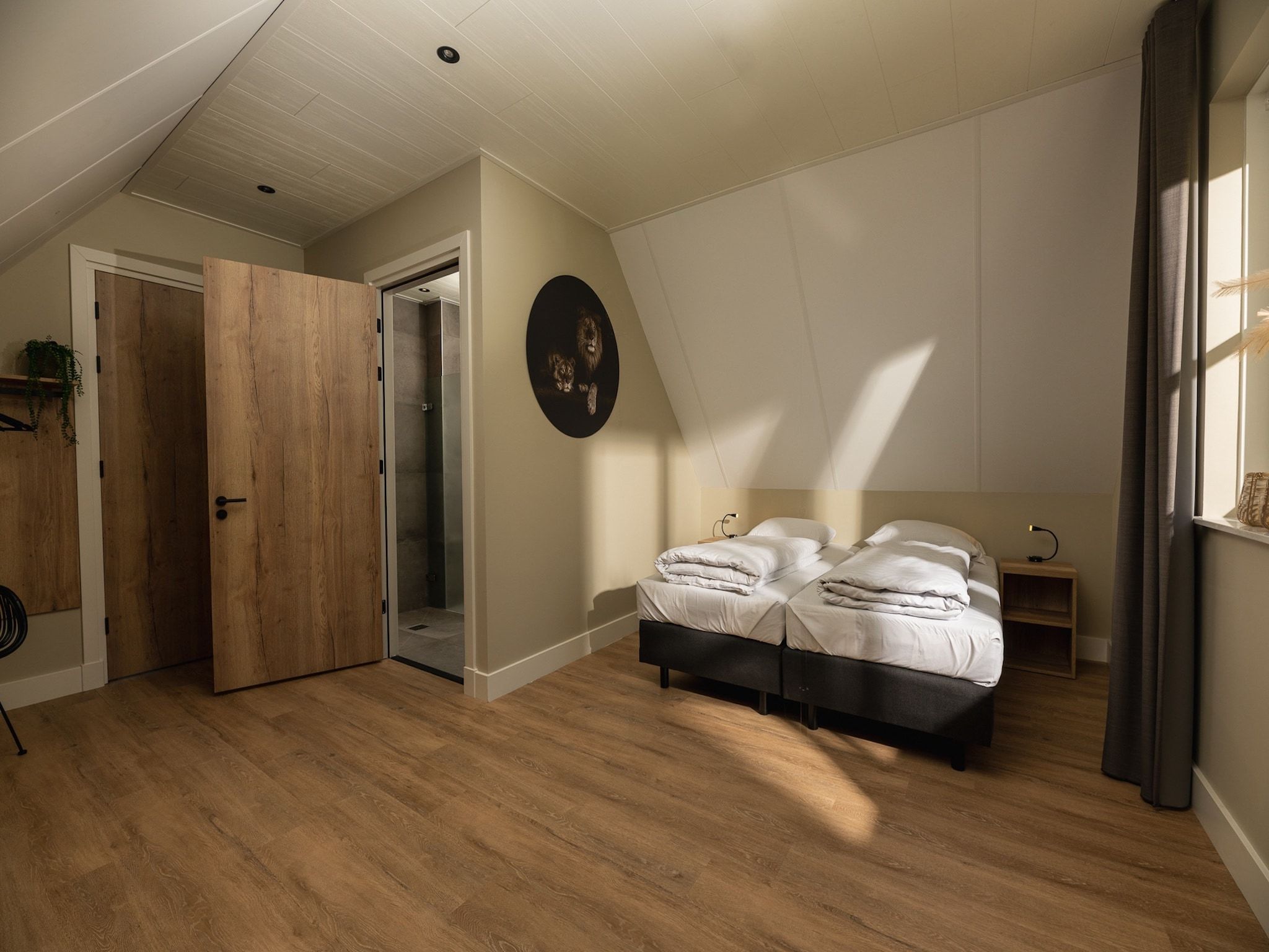 Een slaapkamer van Het Landhuis in Losser